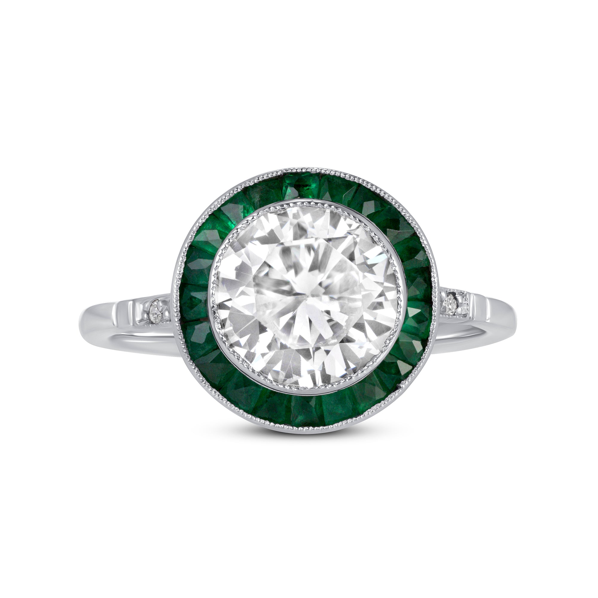 Round Diamond and Emerald Halo Ring in Platinum