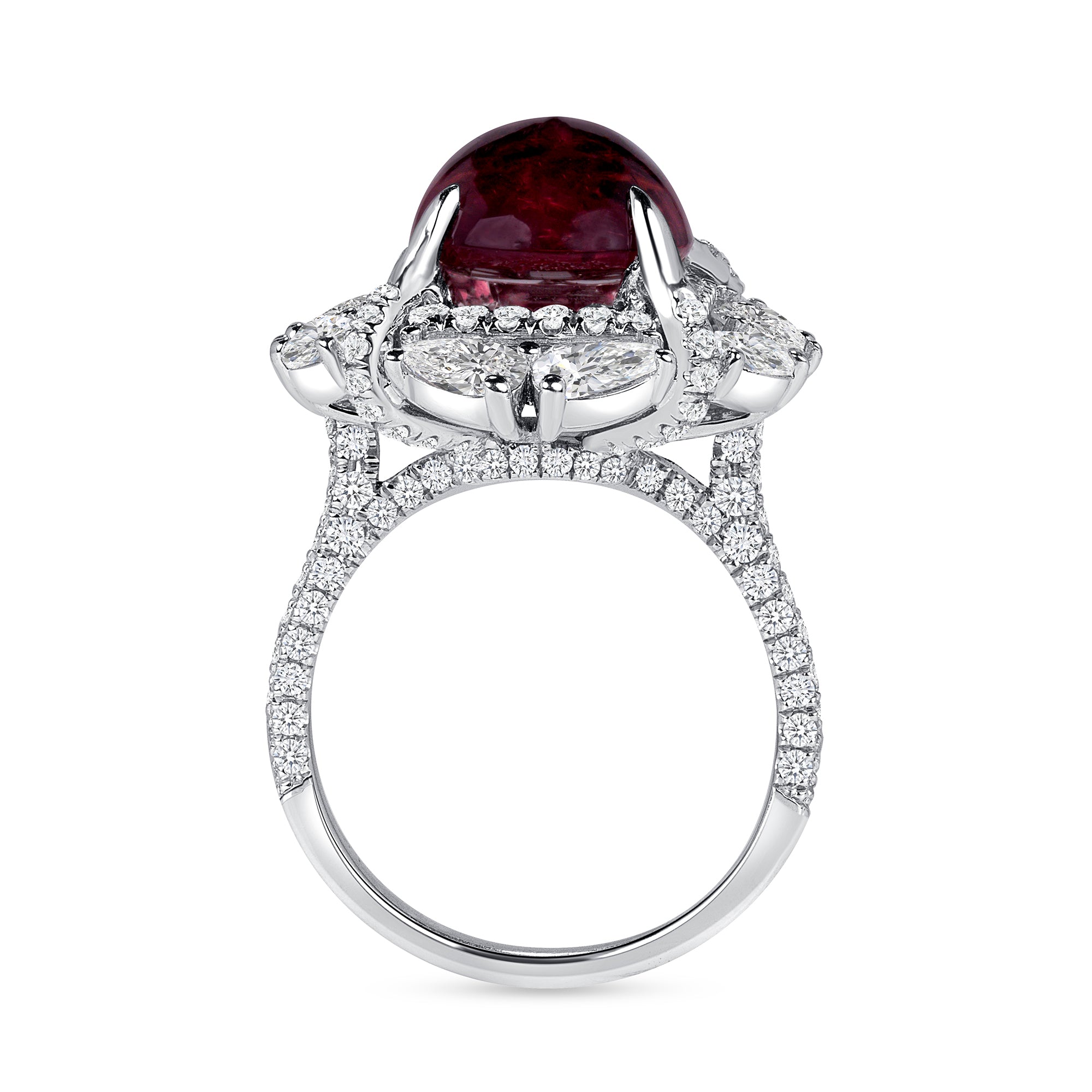 Oval Cut Ruby Cabochon Ring With A Diamond Halo In Platinum Ruthenium