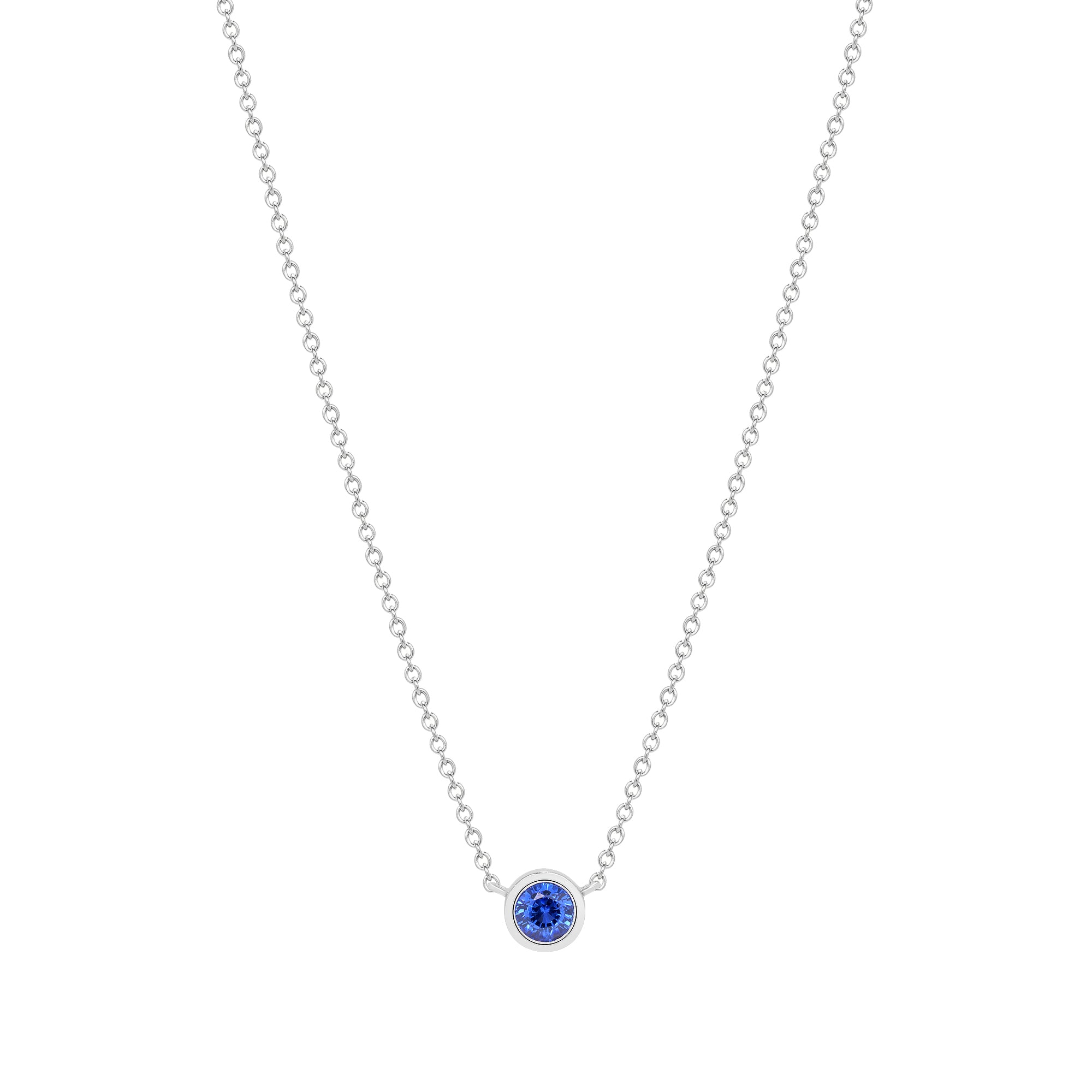 Blue Sapphire Bezel Set Pendant In 18 Karat White Gold