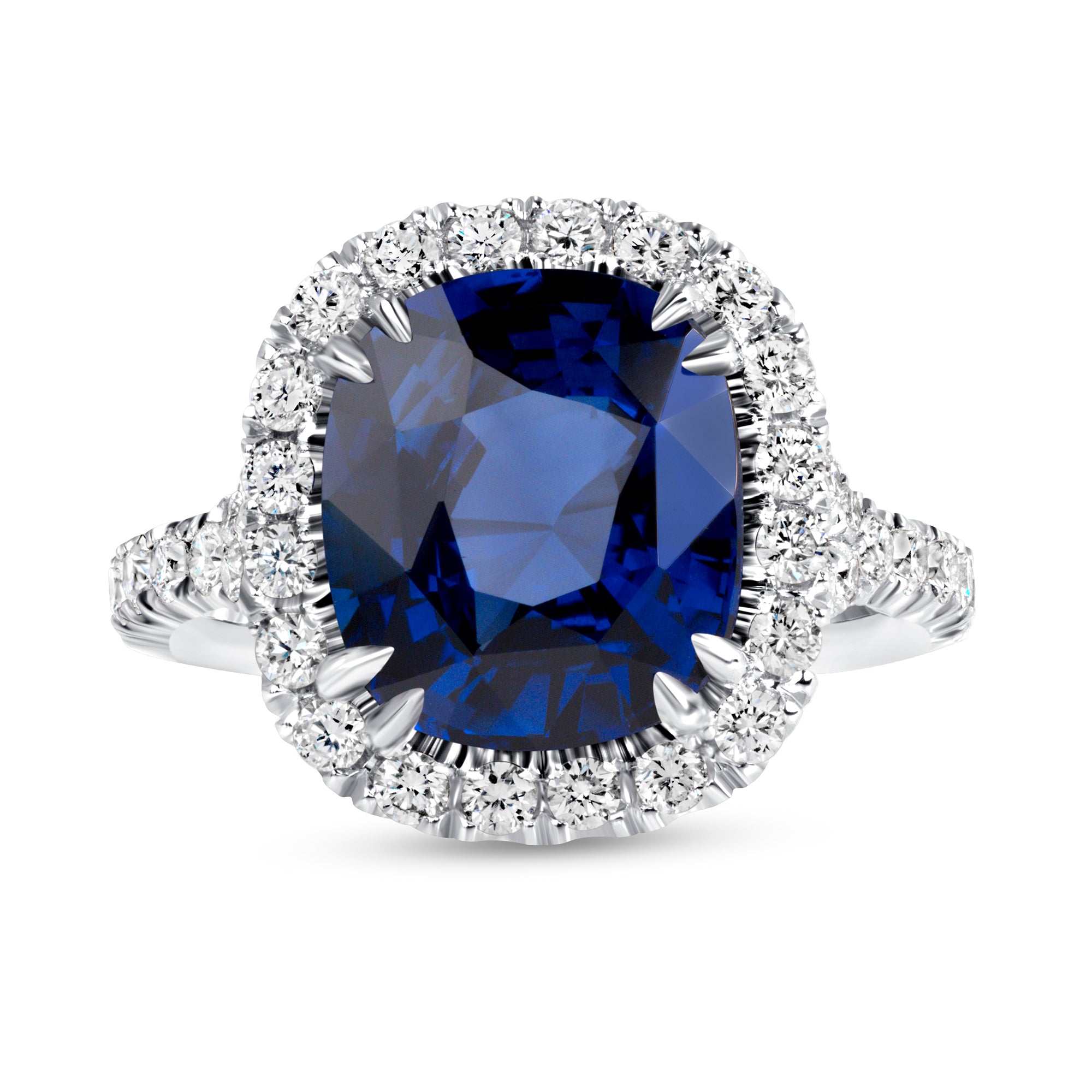 Cushion Cut Blue Sapphire and Diamond Halo Ring in Platinum