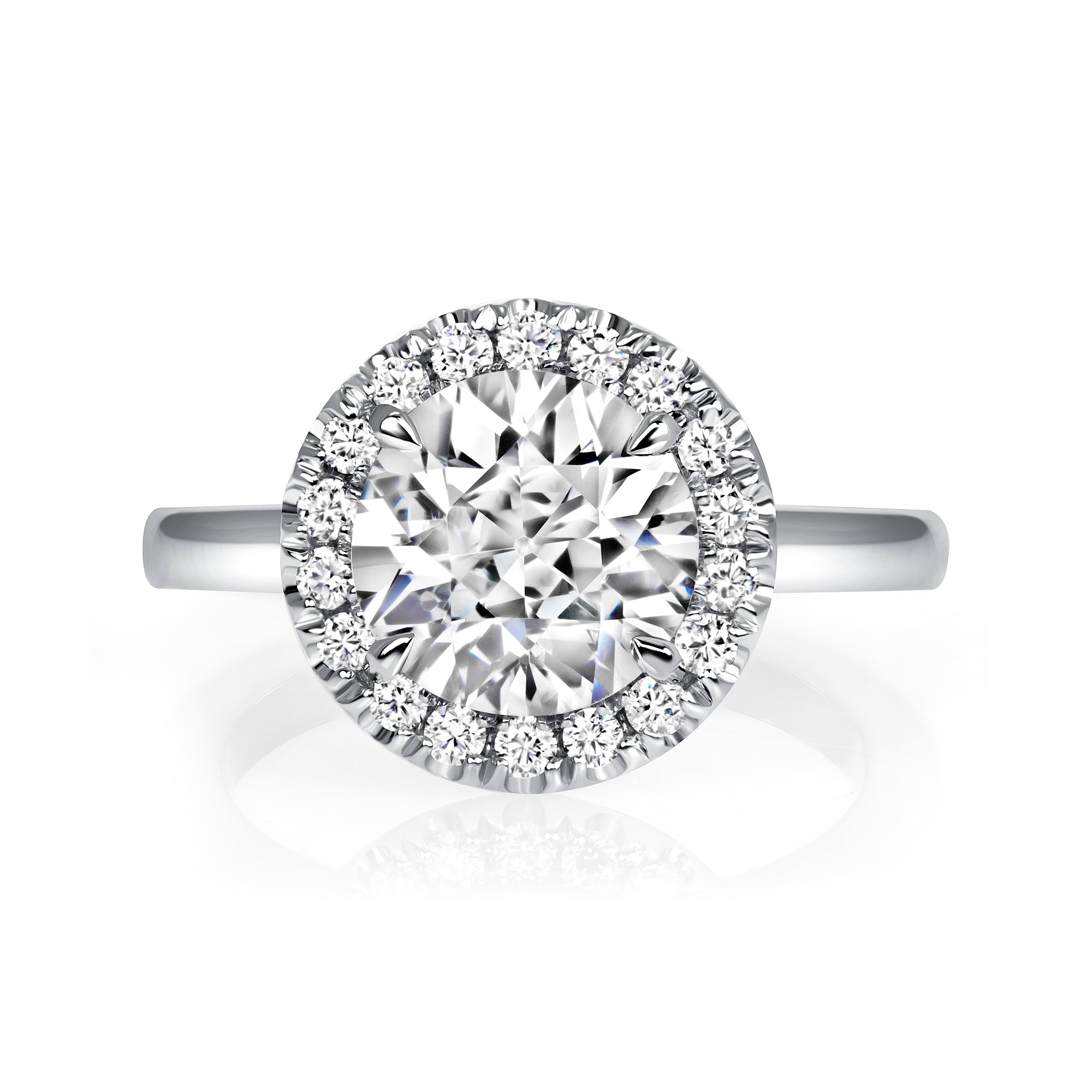 Round Brilliant Cut Diamond Halo Ring in Platinum