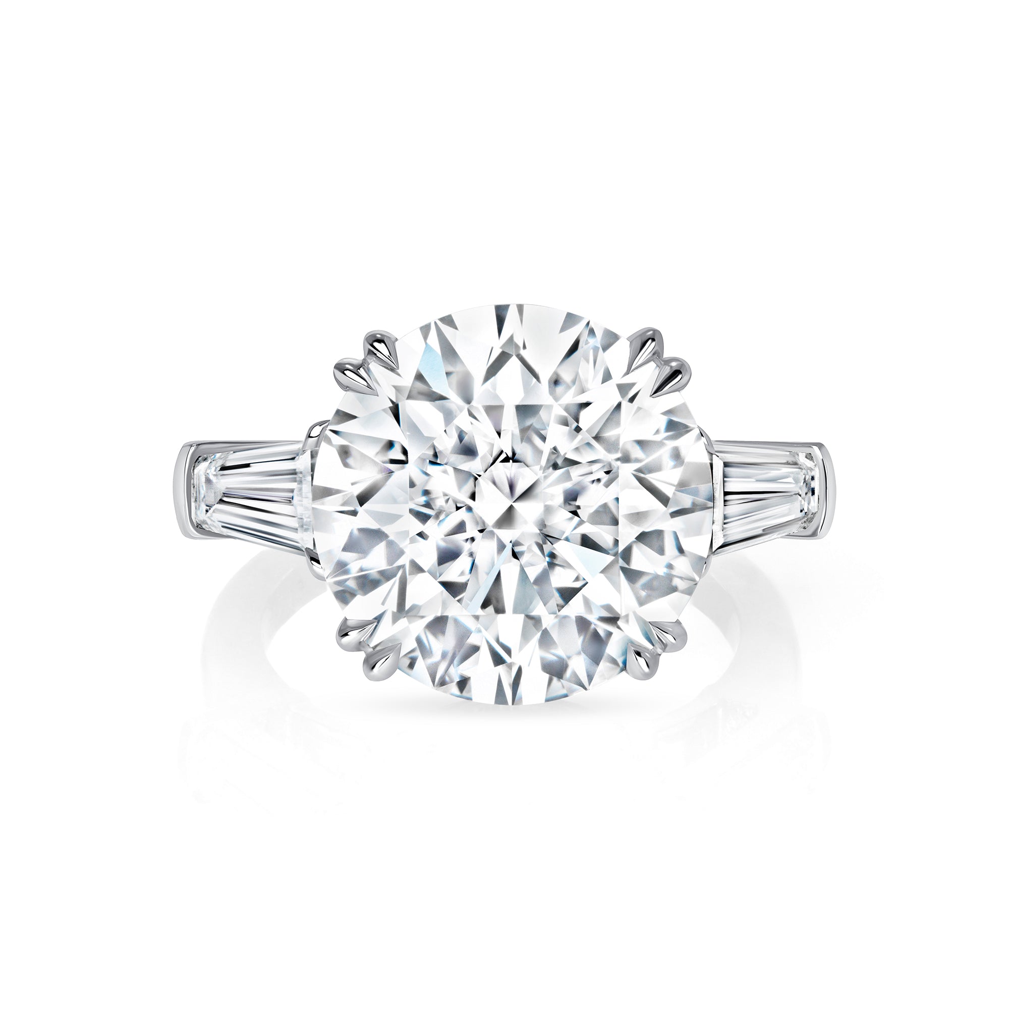 Round Brilliant Diamond & Tapered Baguette Three-Stone Ring in Platinum