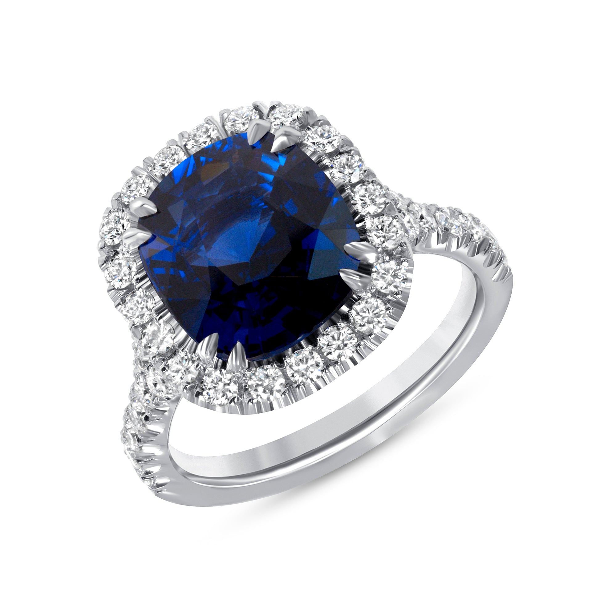 Cushion Cut Blue Sapphire and Diamond Halo Ring in Platinum