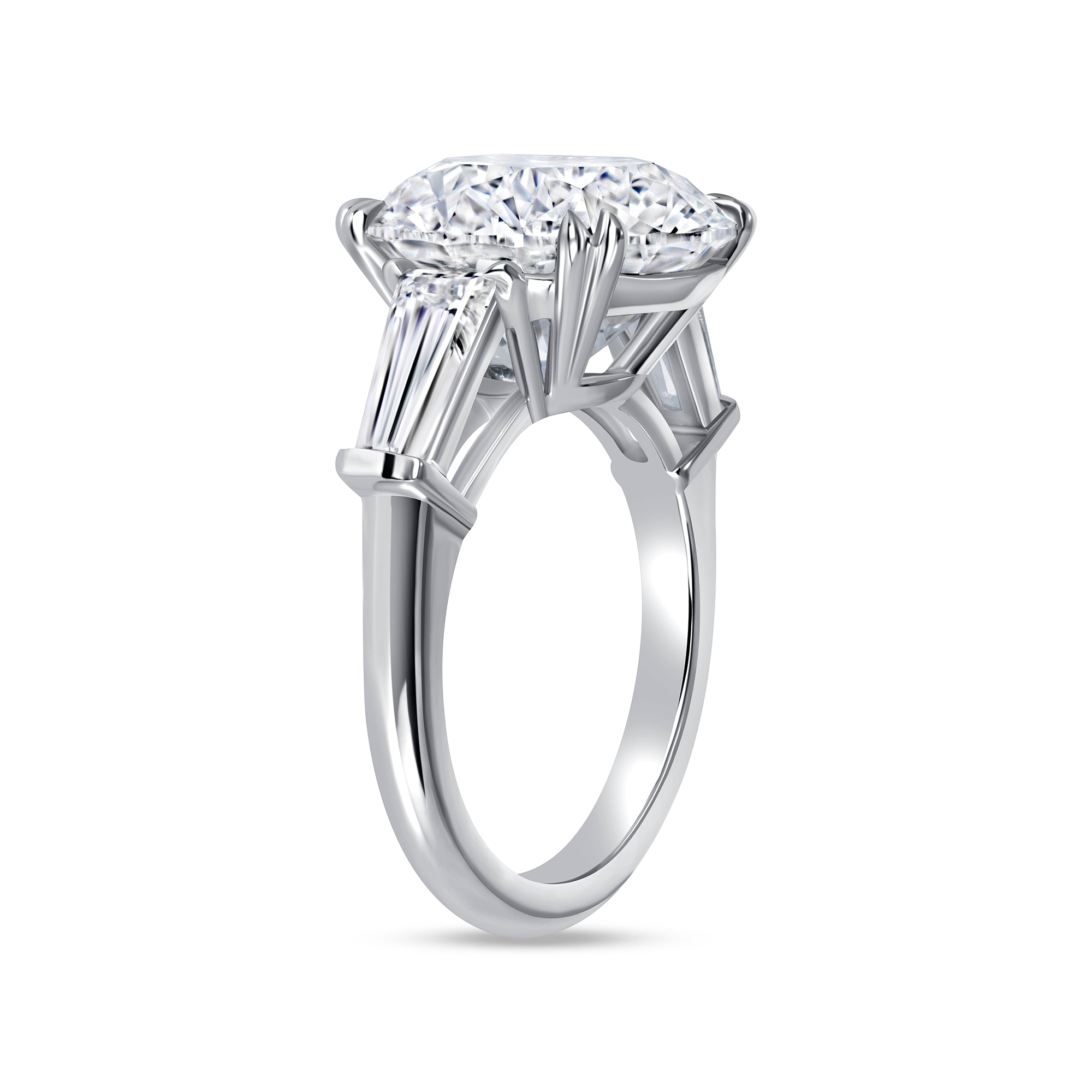 Round Brilliant Diamond & Tapered Baguette Three-Stone Ring in Platinum