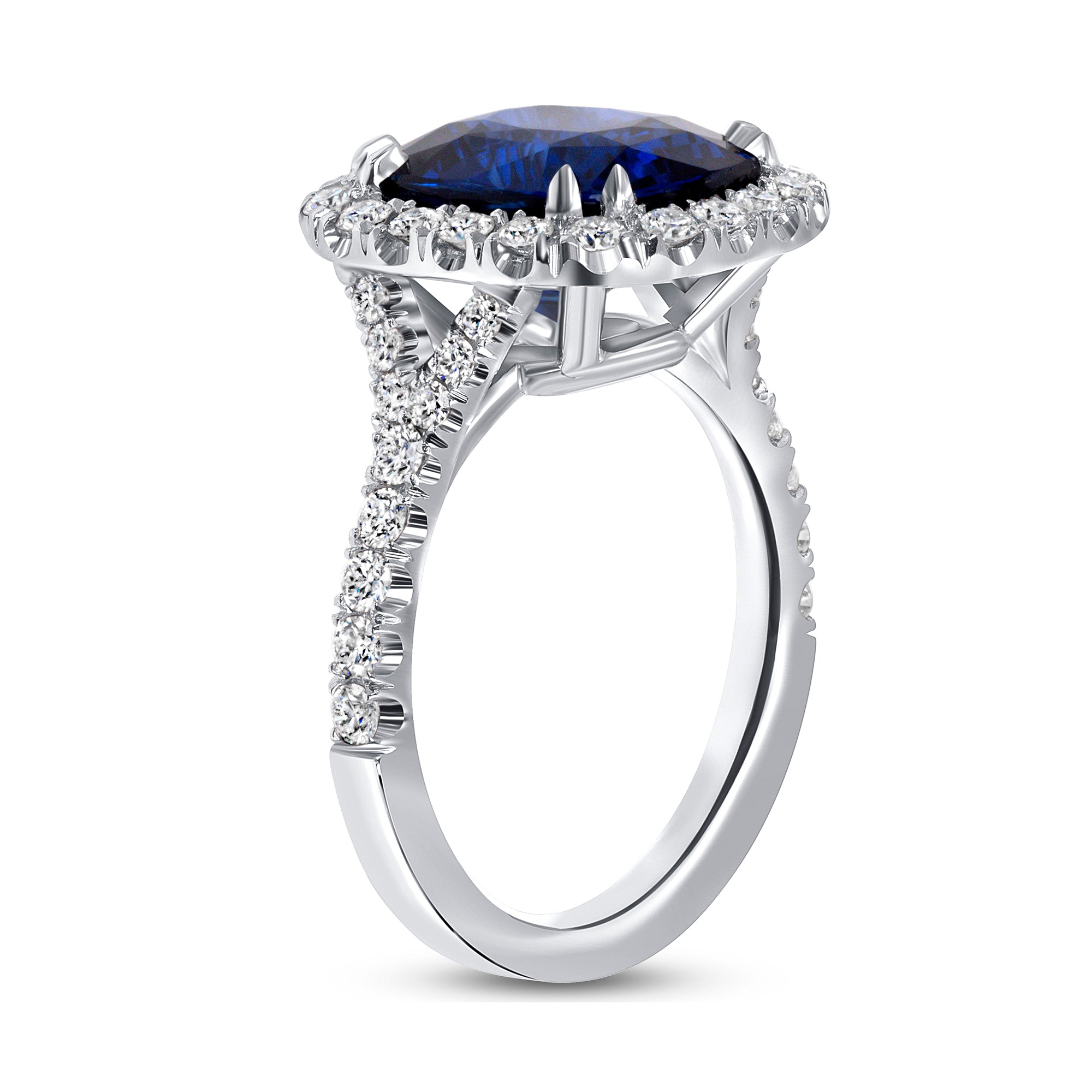 Cushion Cut Blue Sapphire and Diamond Halo Ring in Platinum