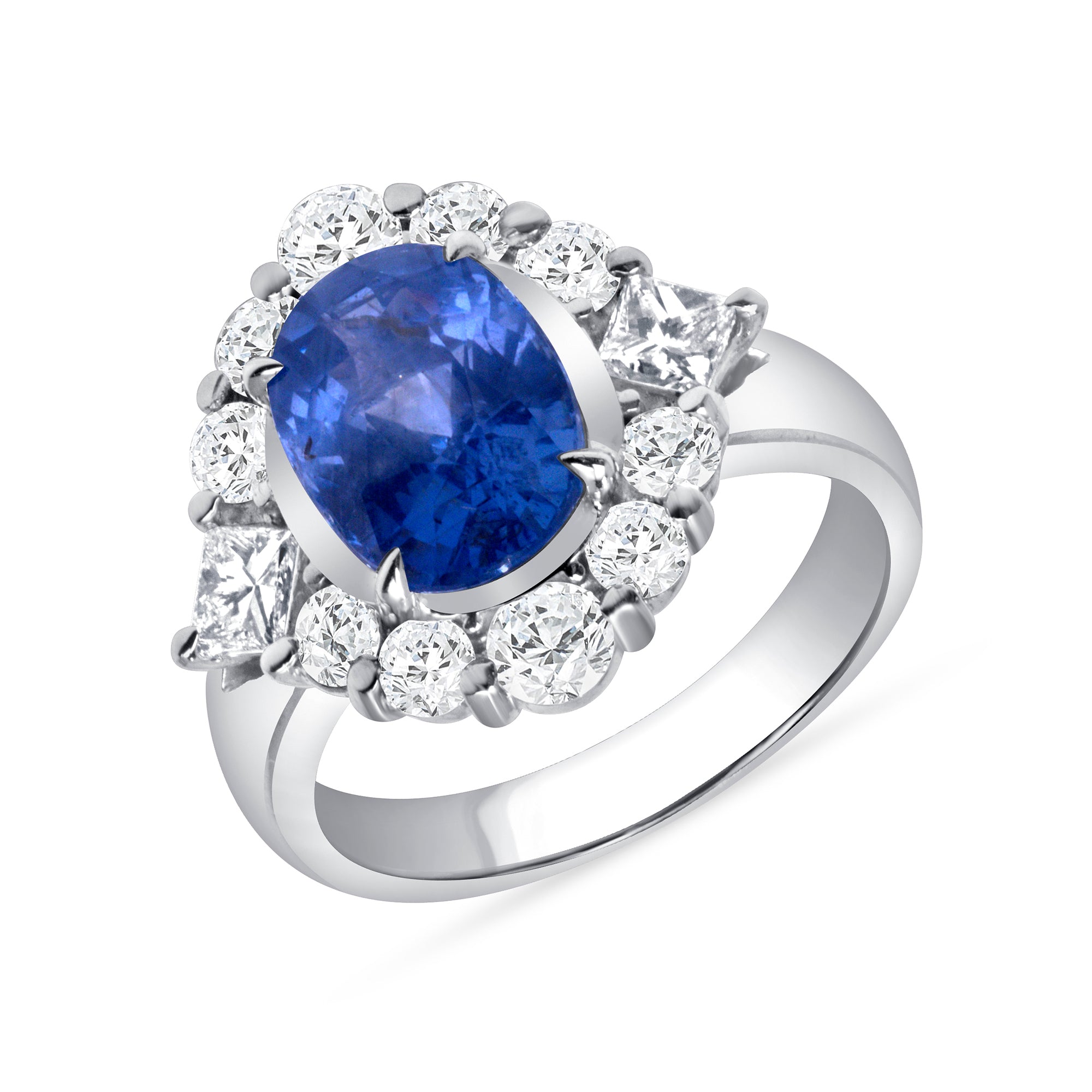 Oval Blue Sapphire and Diamond Halo Ring in Platinum