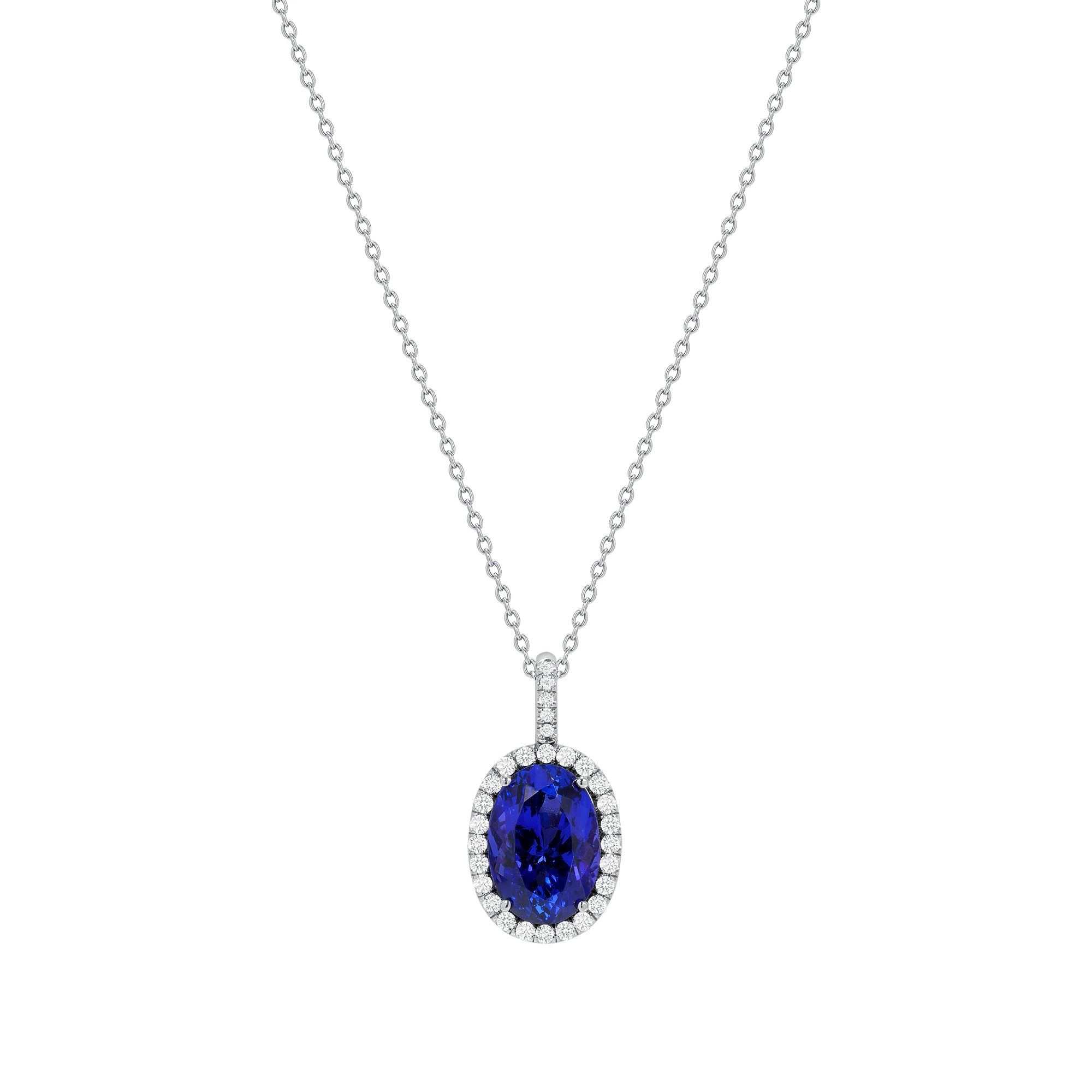 Oval Shape Tanzanite Diamond Halo Pendant In 18 Karat White Gold