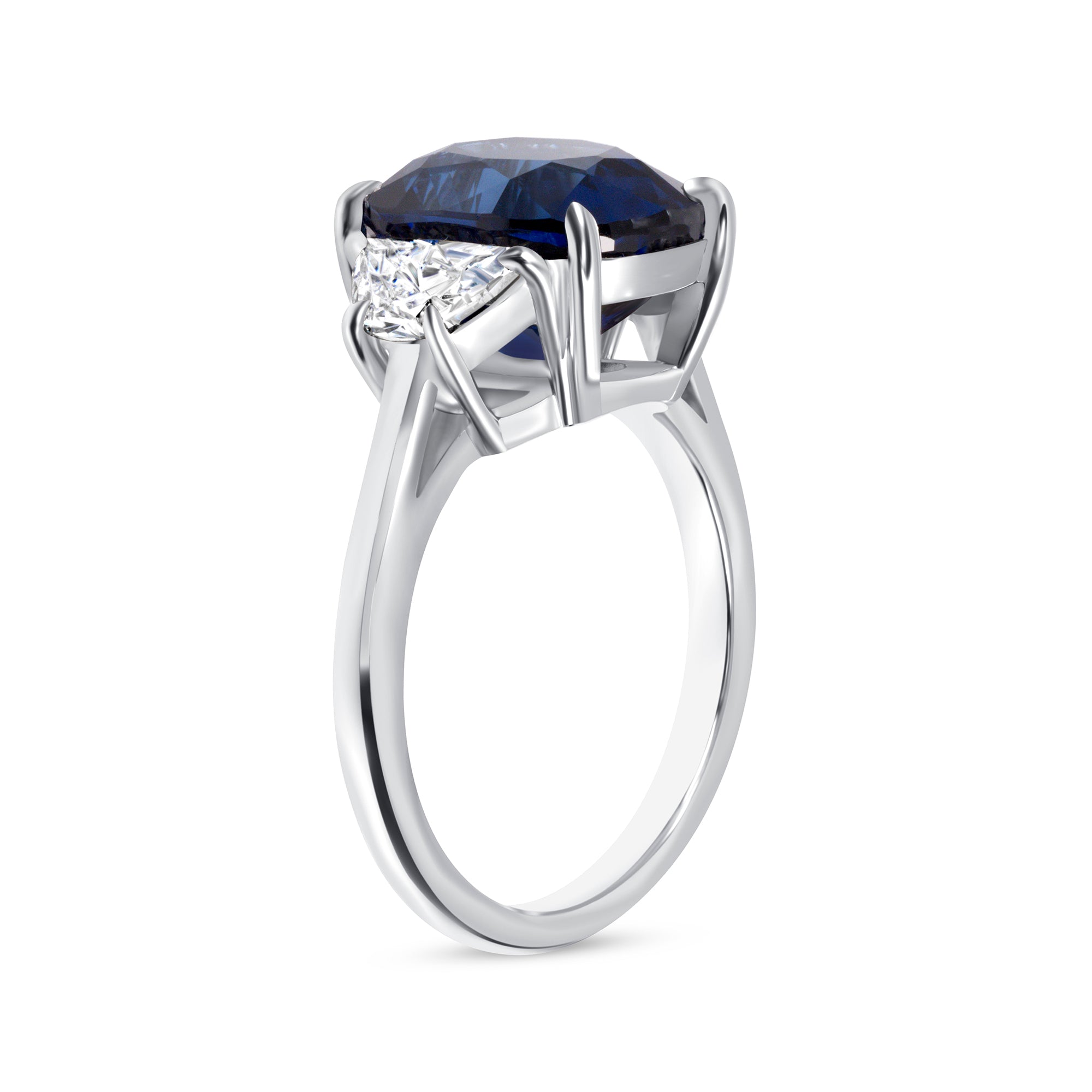 Cushion Cut Blue Sapphire and Trapezoid Cut Diamond Three Stone Ring in Platinum