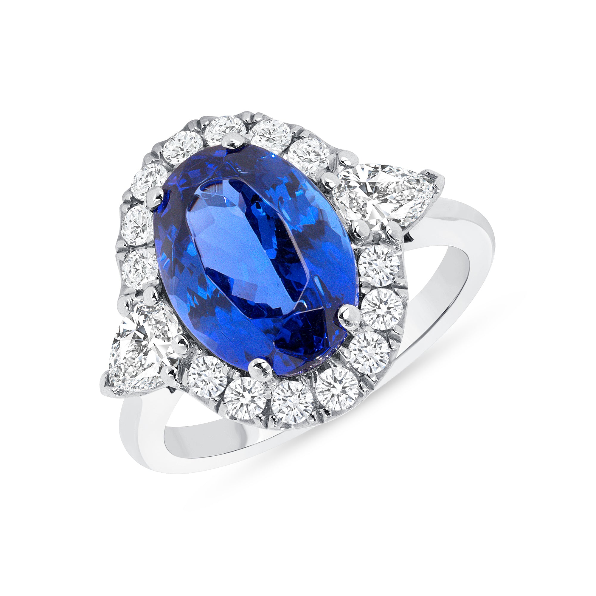 Tanzanite And Pear Shape Diamond Halo Ring In Platinum.