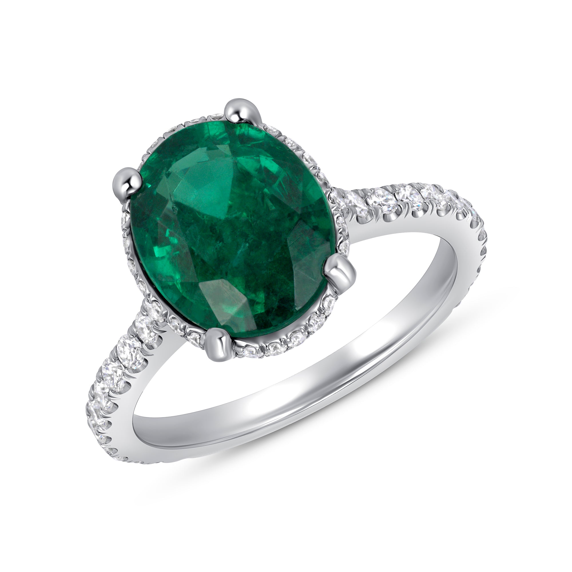 Oval Cut Emerald and Diamond Ring in Platinum