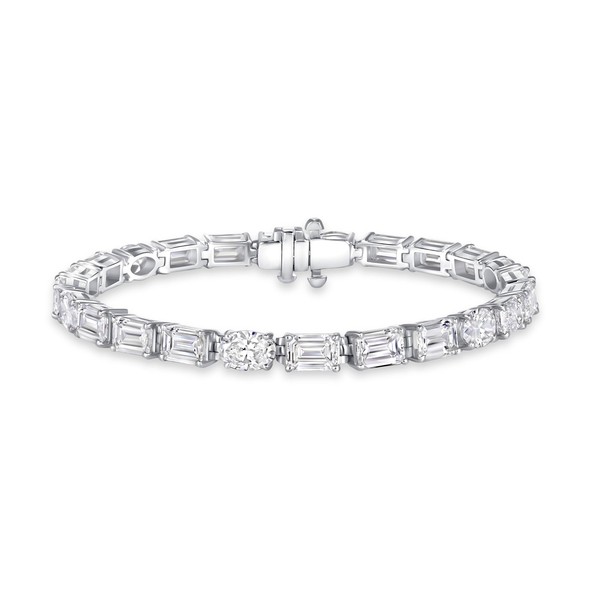 Emerald and Oval Cut Diamond Tennis Bracelet in 18K White Gold
