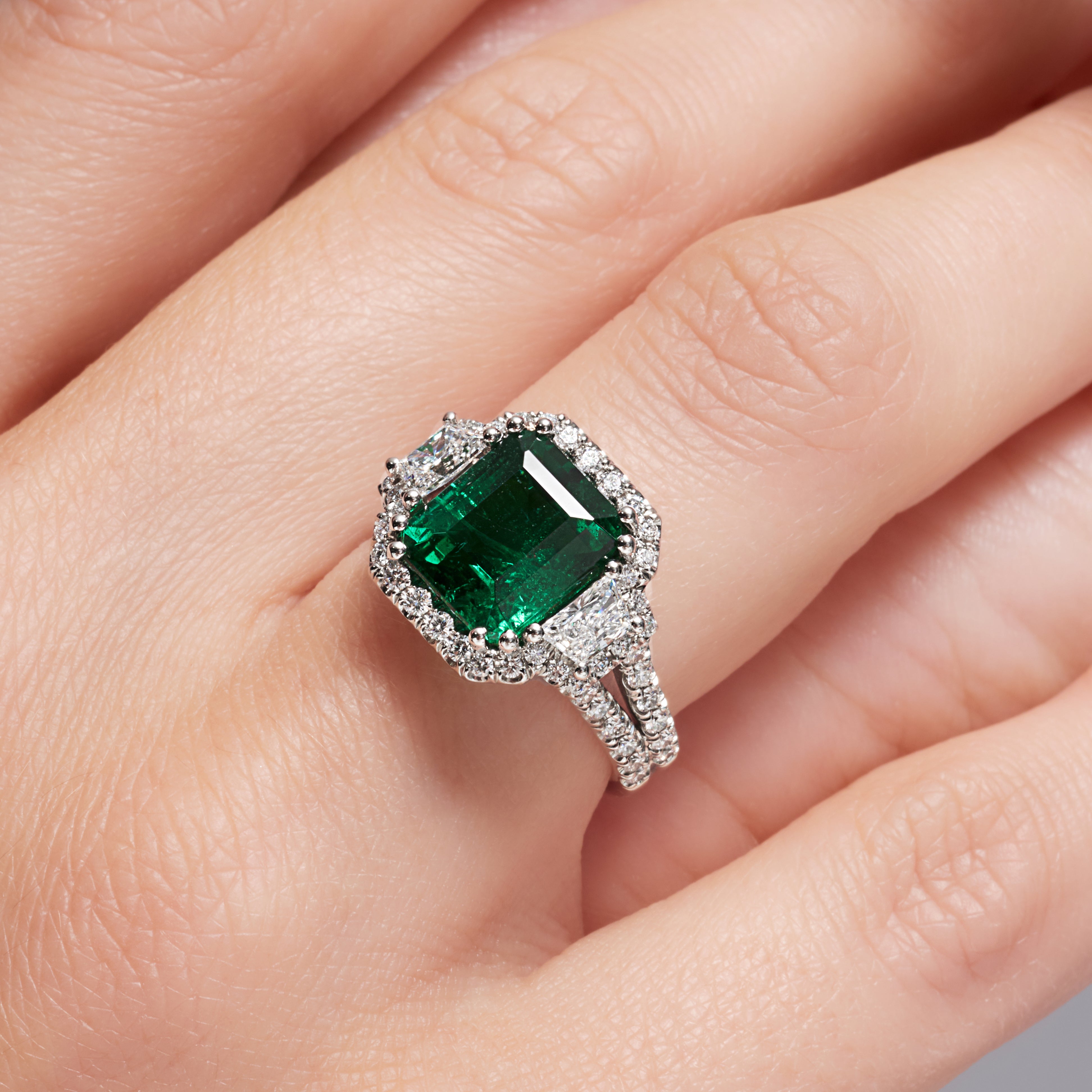 Emerald Cut Green Emerald Diamond Halo Ring In Platinum