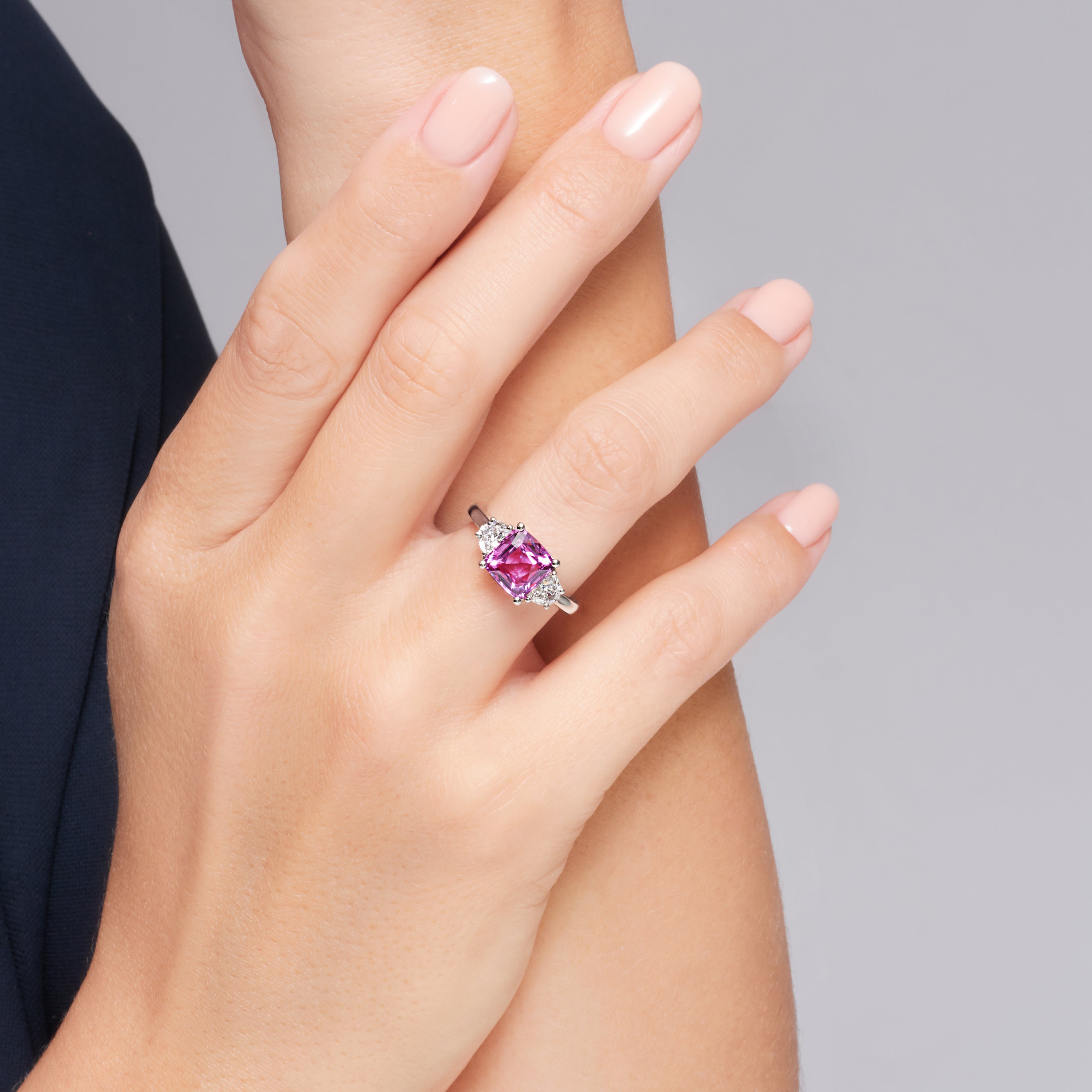 Pink Sapphire And Trapezoid Brilliant Cut Diamond Ring In Platinum