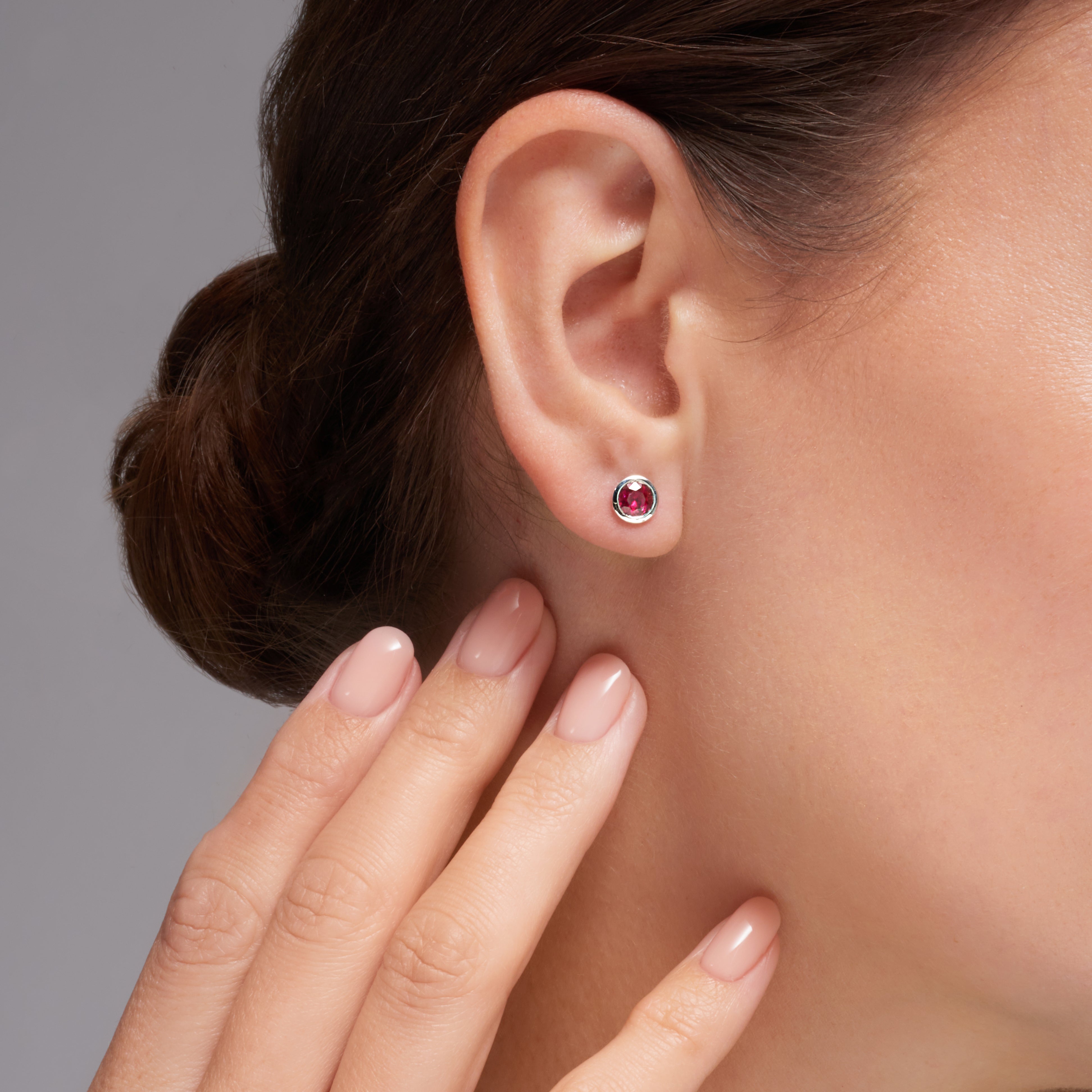 Ruby Bezel Set Earrings In 18 Karat White Gold