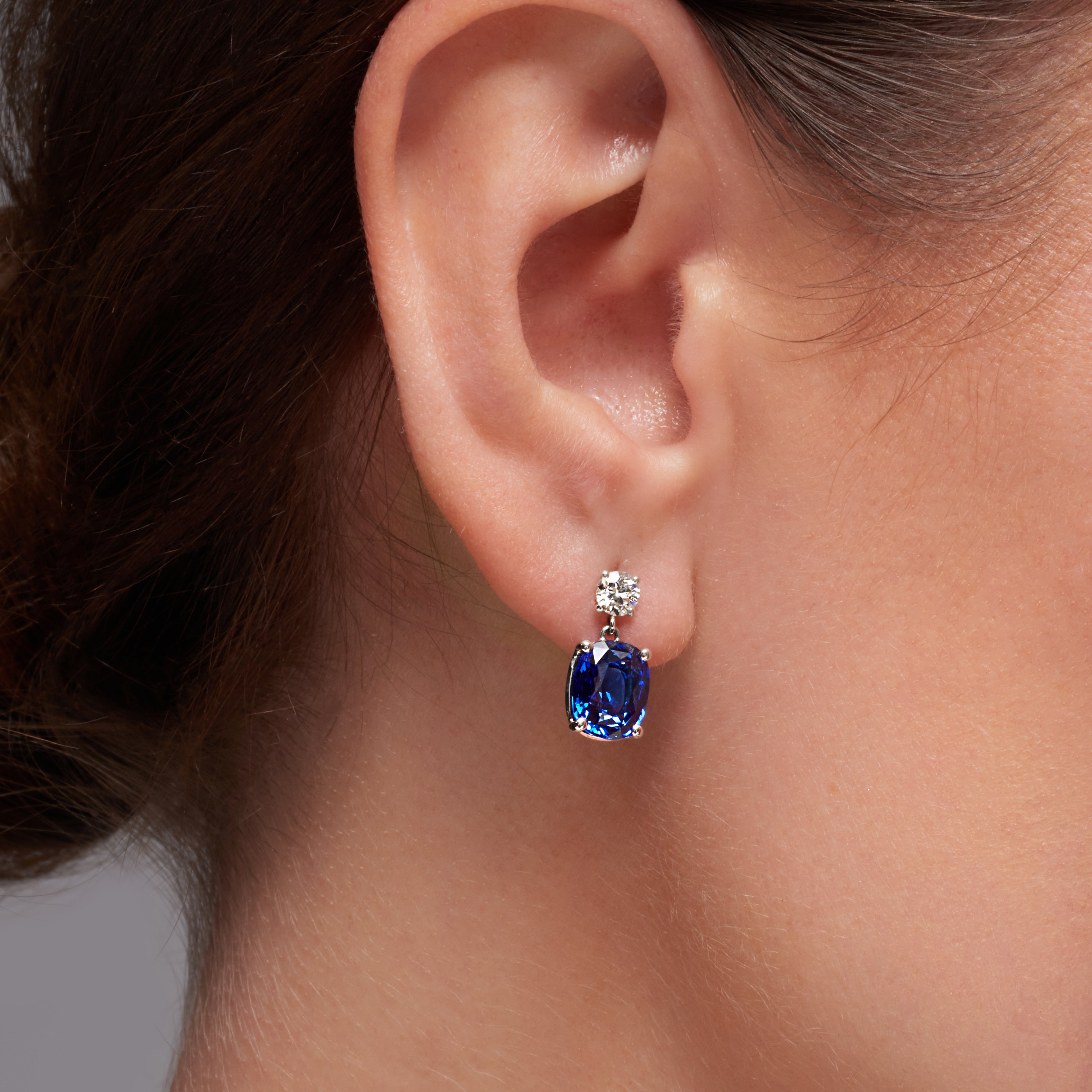 Blue Sapphire And Diamond Dangling Earrings In 18 Karat White Gold