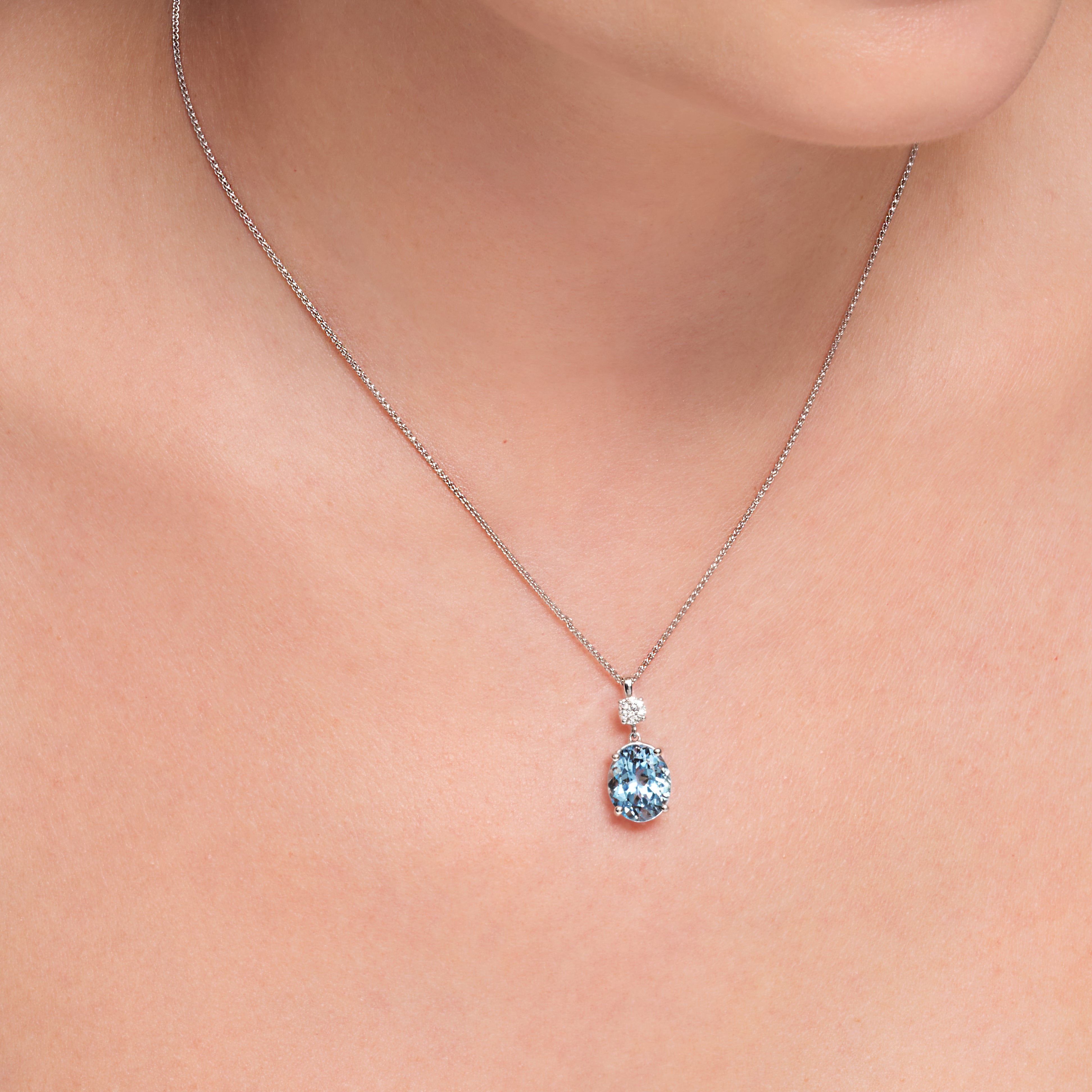 Aquamarine And Diamond Dangling Pendant In 18 Karat White Gold
