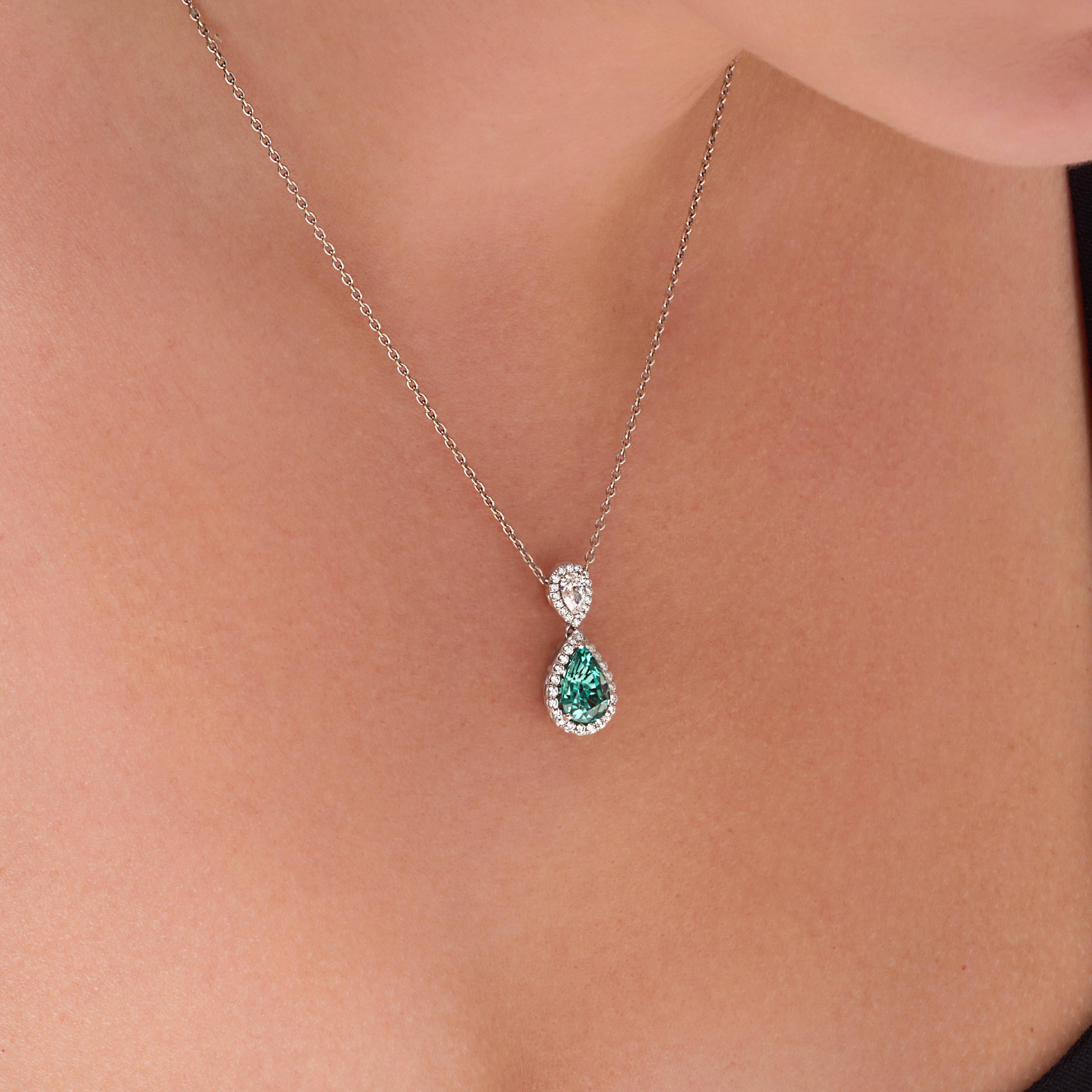 Blue Lagoon Tourmaline Diamond Halo Pendant In 18 karat white gold