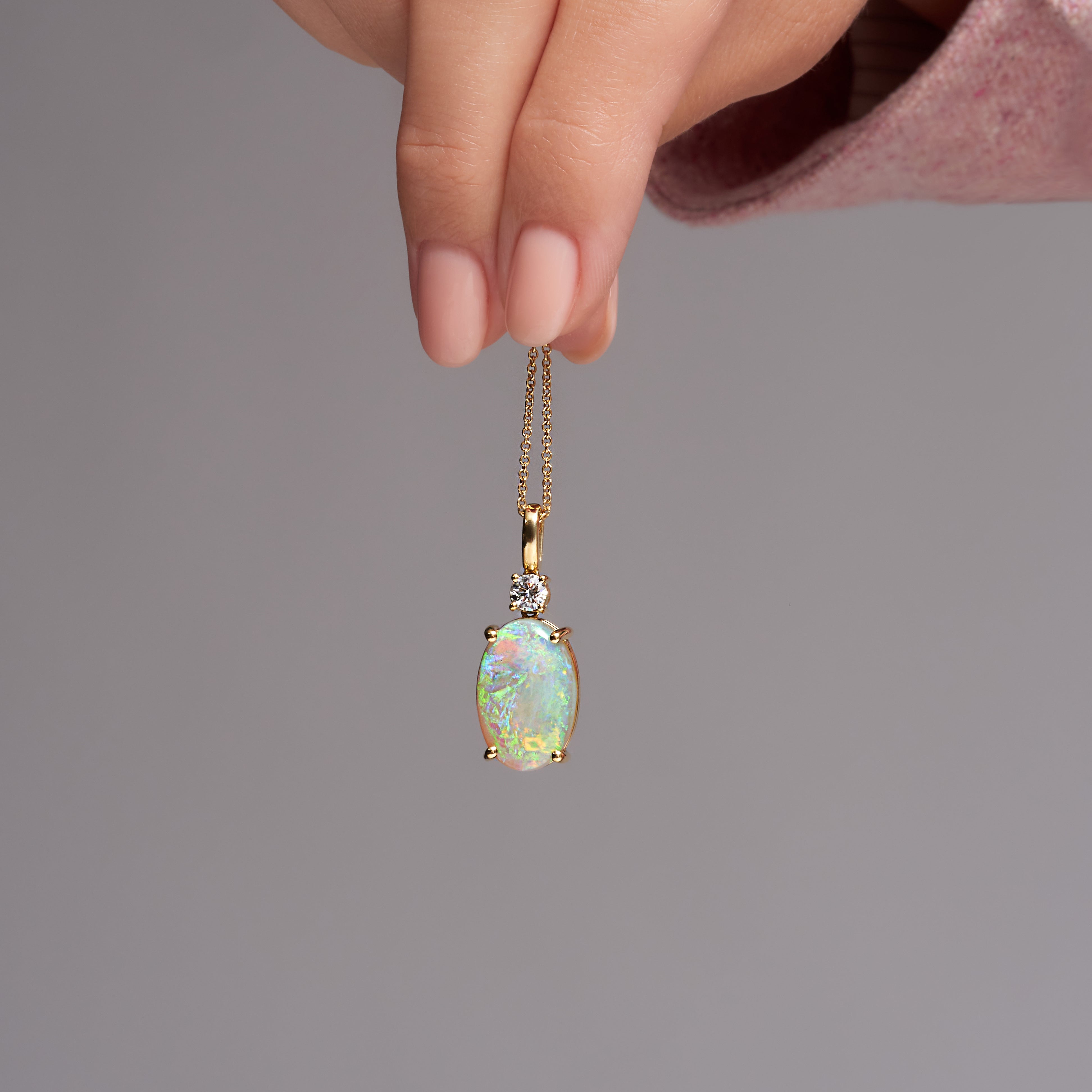 Opal And Diamond Pendant In 18 Karat Yellow Gold