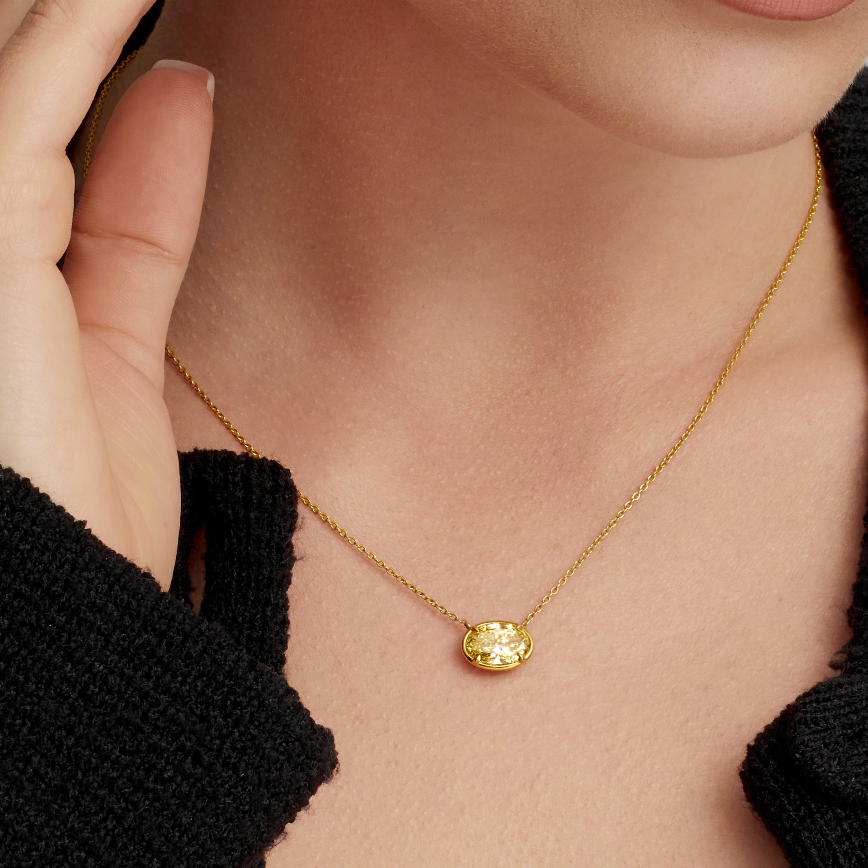 Oval Cut Fancy Light Yellow Diamond Necklace in 18 Karat Yellow Gold