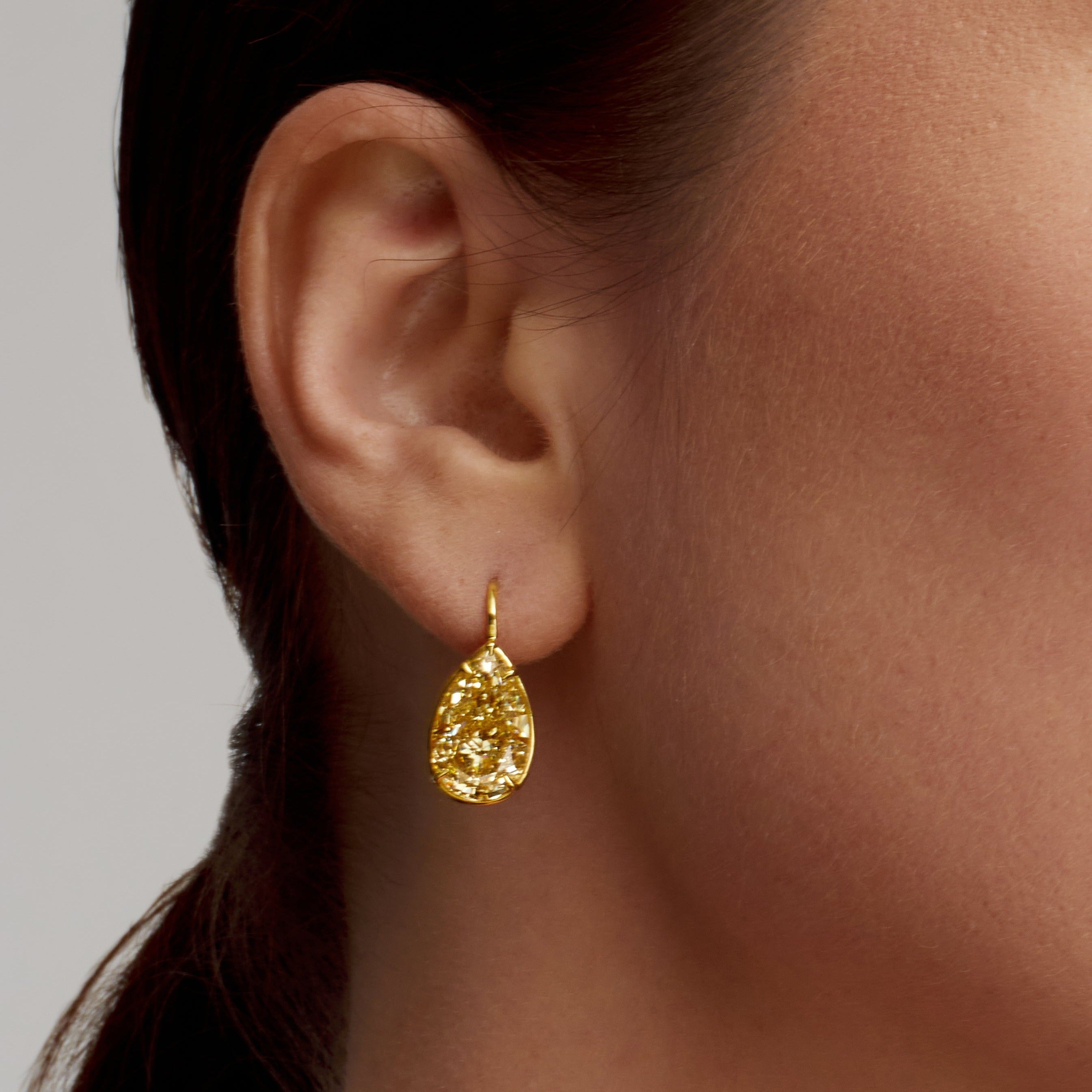 Pear Shape Bezel Set Fancy Yellow Diamond Dangle Earrings in 18 Karat Yellow Gold