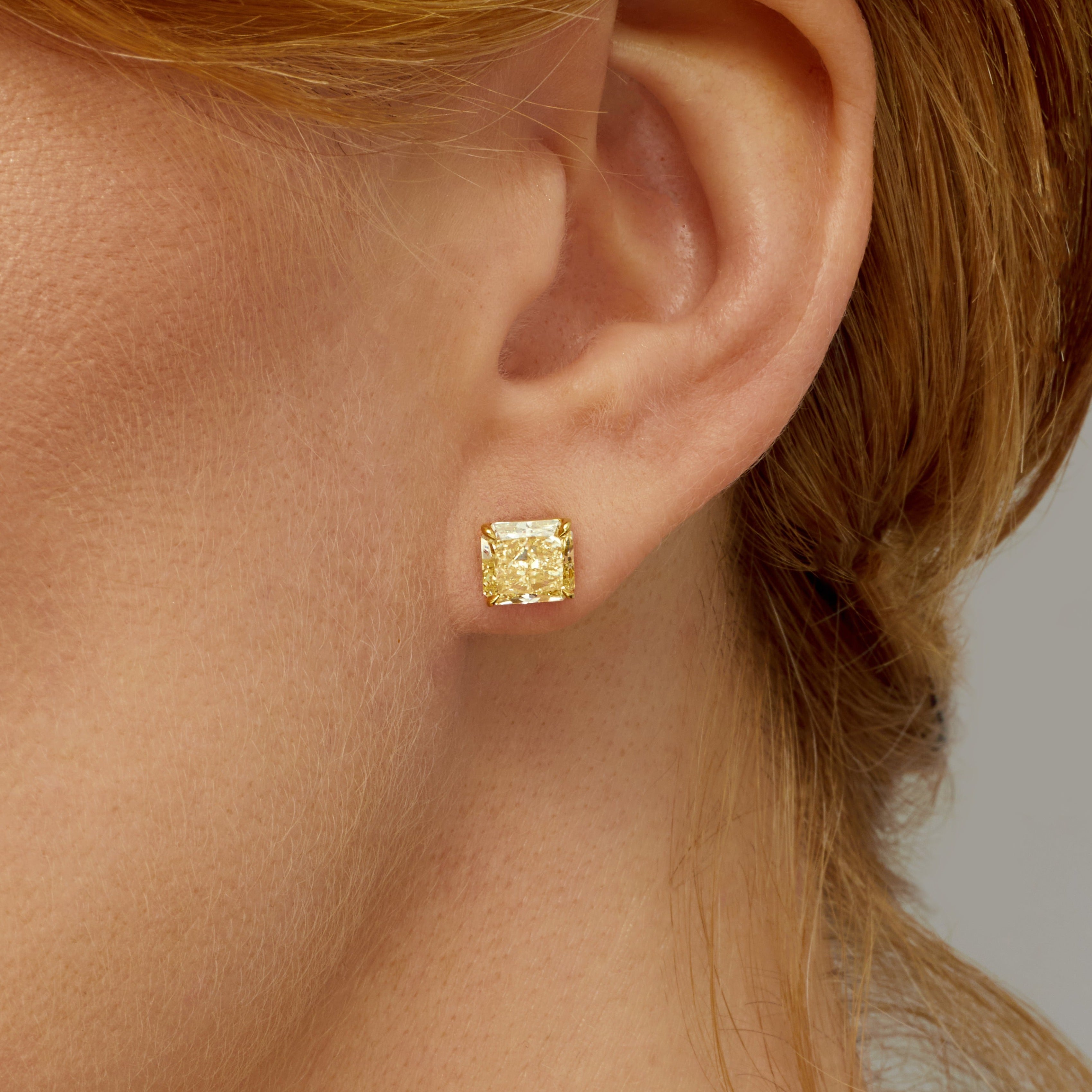 Radiant Cut Fancy Intense Yellow Diamond Stud Earrings in 18 Karat Yellow Gold