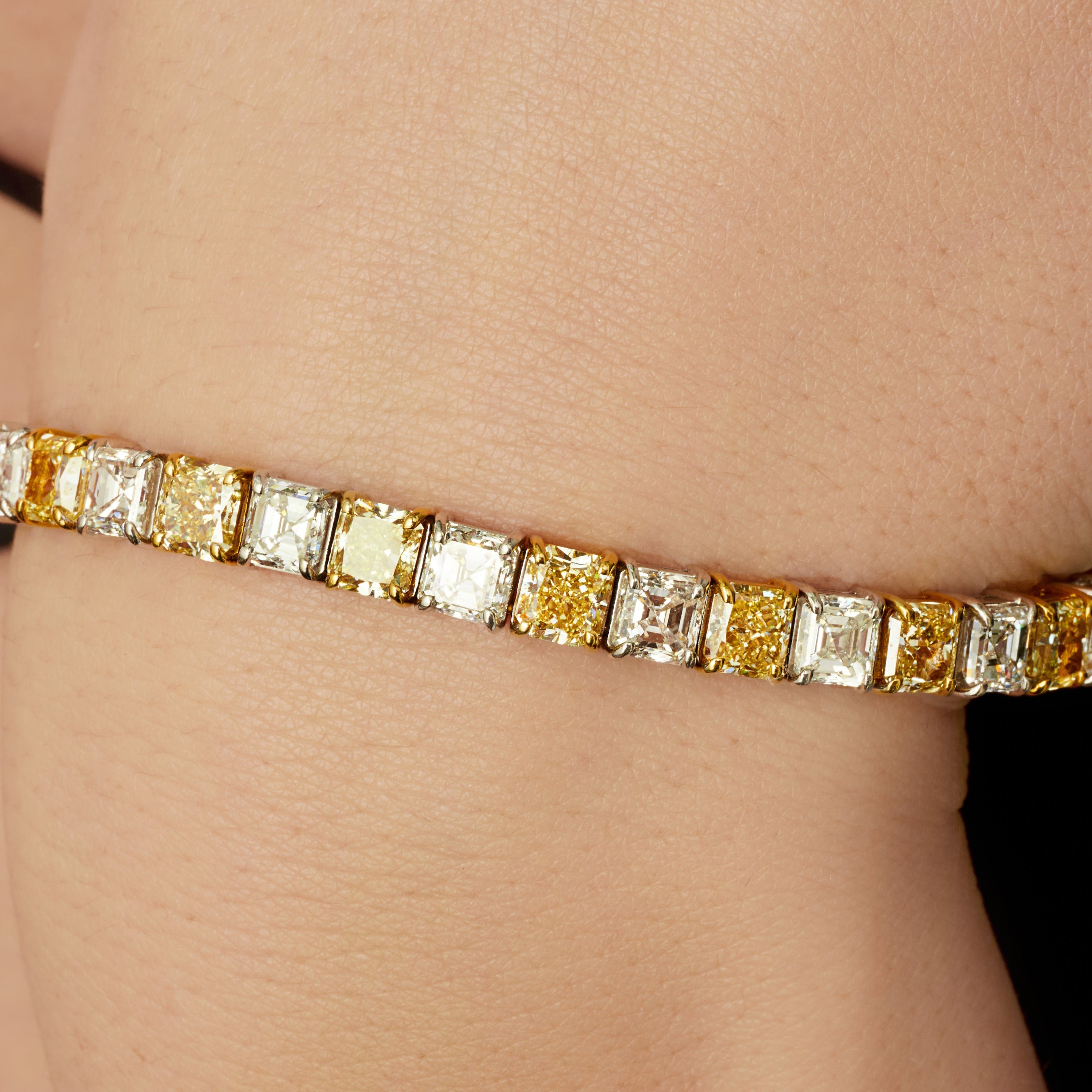 Alternating Radiant Cut Fancy Yellow and White Diamond Tennis Bracelet in 18 Karat Yellow Gold and Platinum