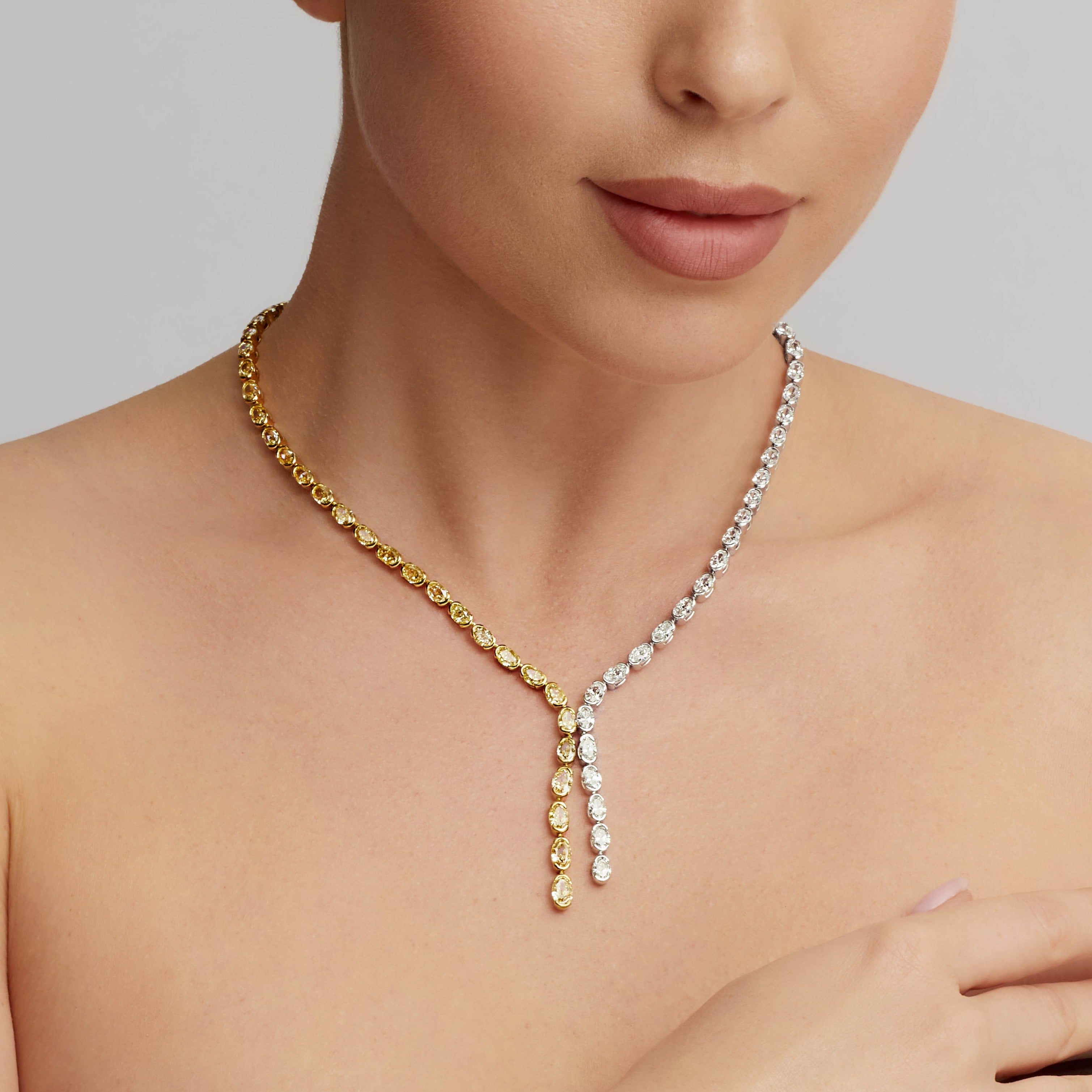 Oval Cut White and Yellow Diamond Lariat Necklace in 18 Karat White Gold and Yellow Gold