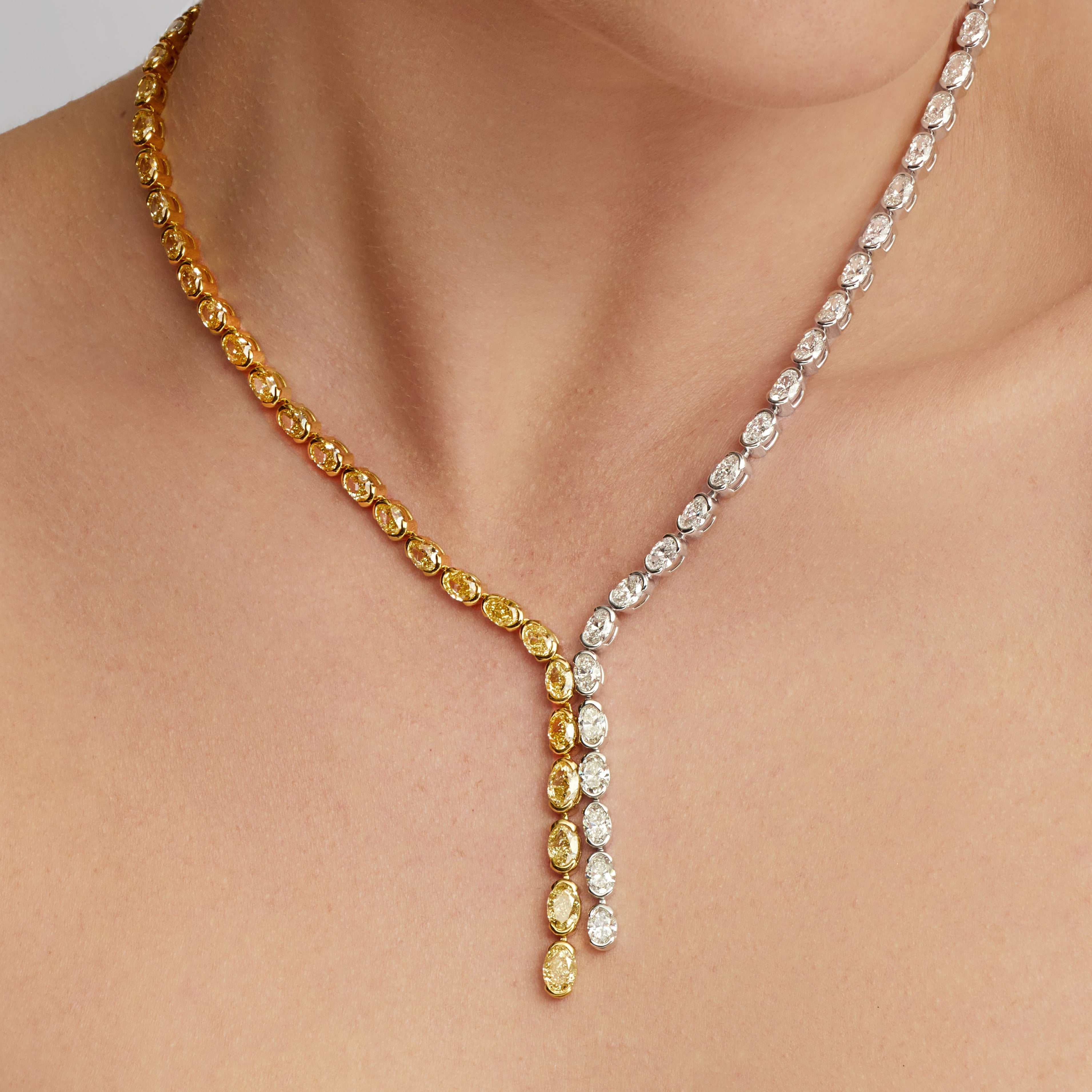 Oval Cut White and Yellow Diamond Lariat Necklace in 18 Karat White Gold and Yellow Gold