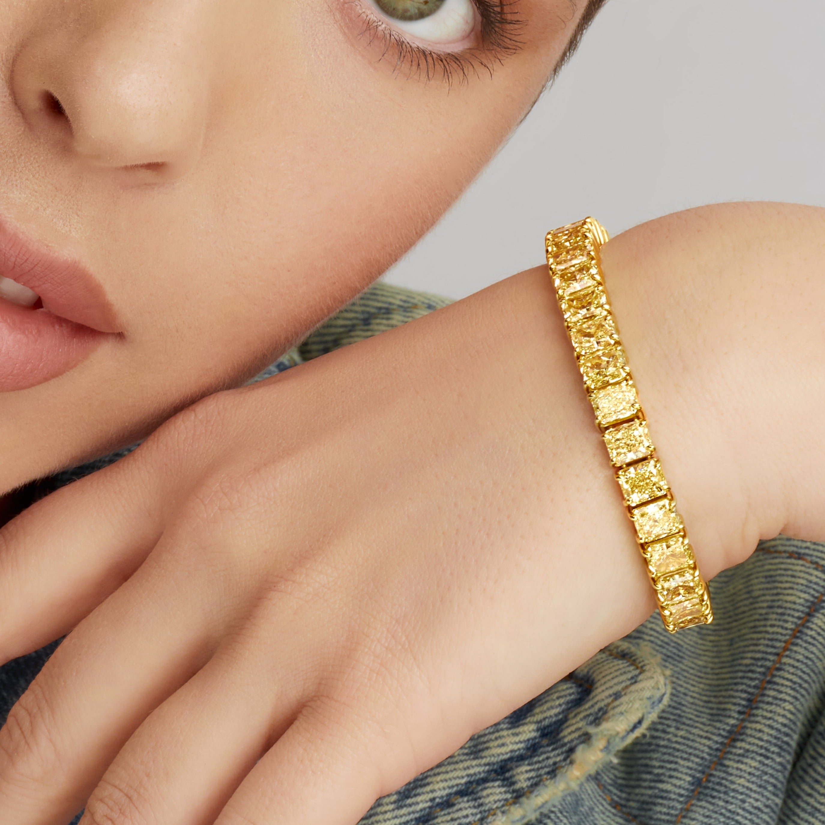 Radiant Cut Fancy Yellow Diamond Tennis Bracelet in 18 Karat Yellow Gold