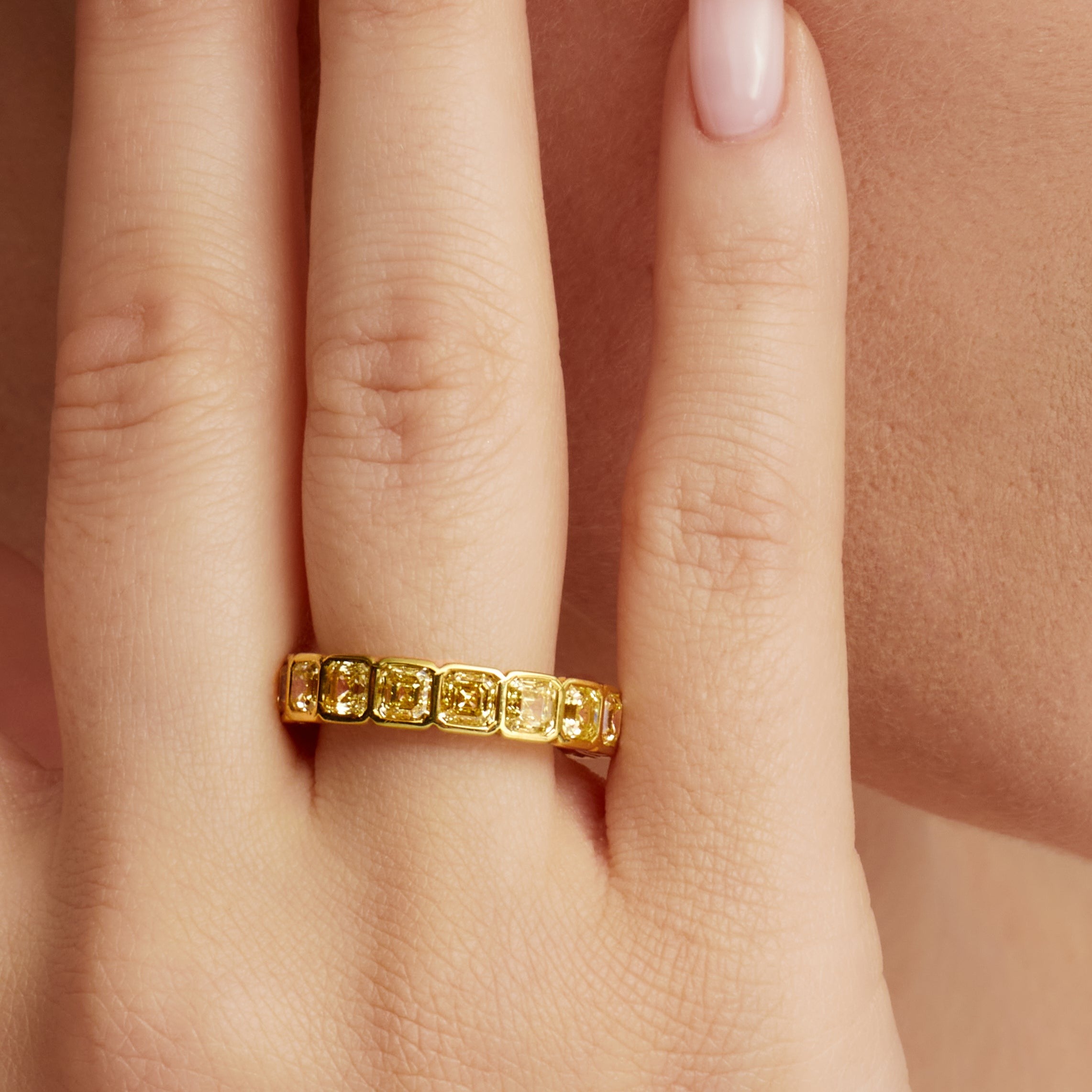 Asscher Cut Bezel Set Yellow Diamond Eternity Band in 18 Karat Yellow Gold