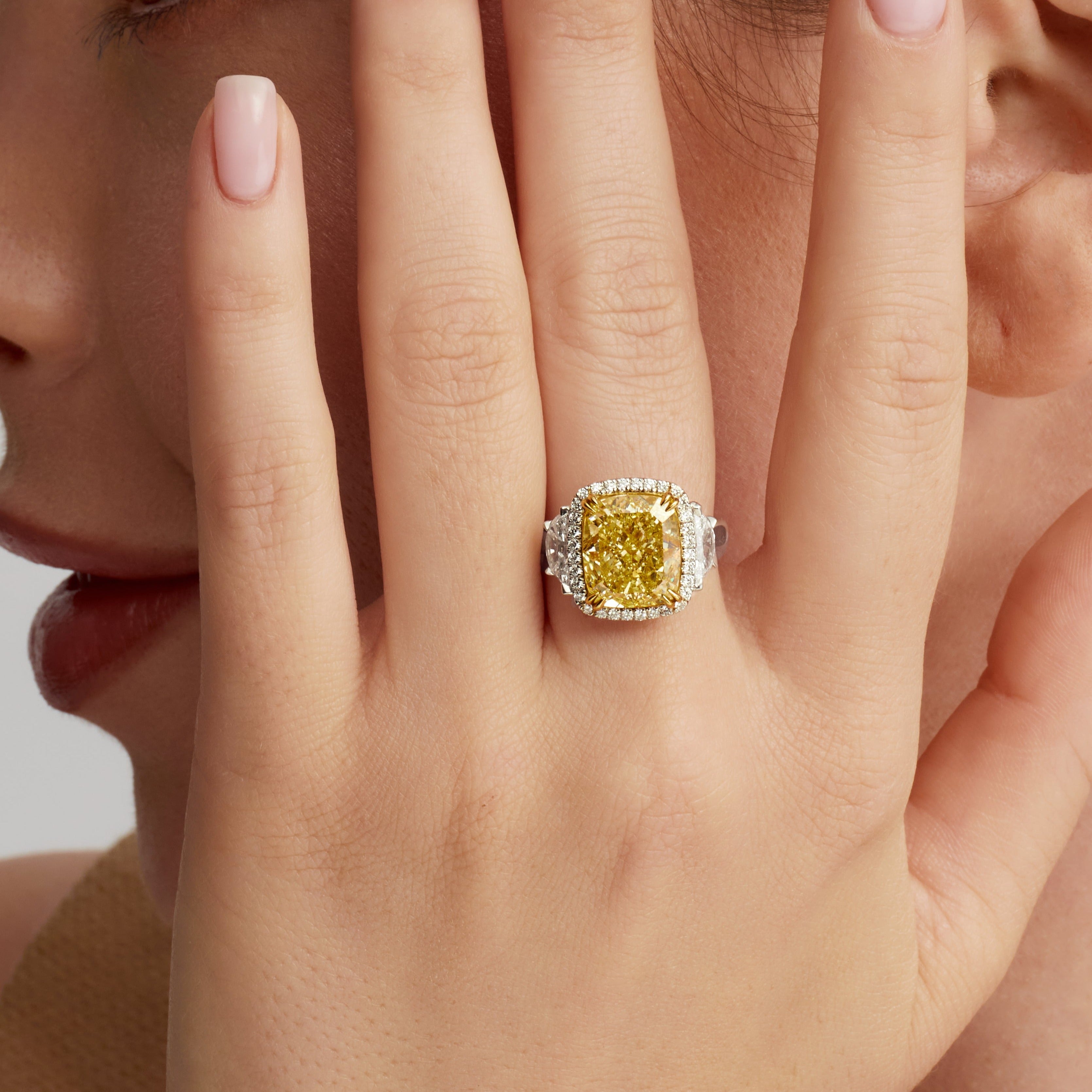 Cushion Cut Fancy Intense Yellow Diamond and Pavé Diamond Ring in 18 Karat Yellow Gold and Platinum