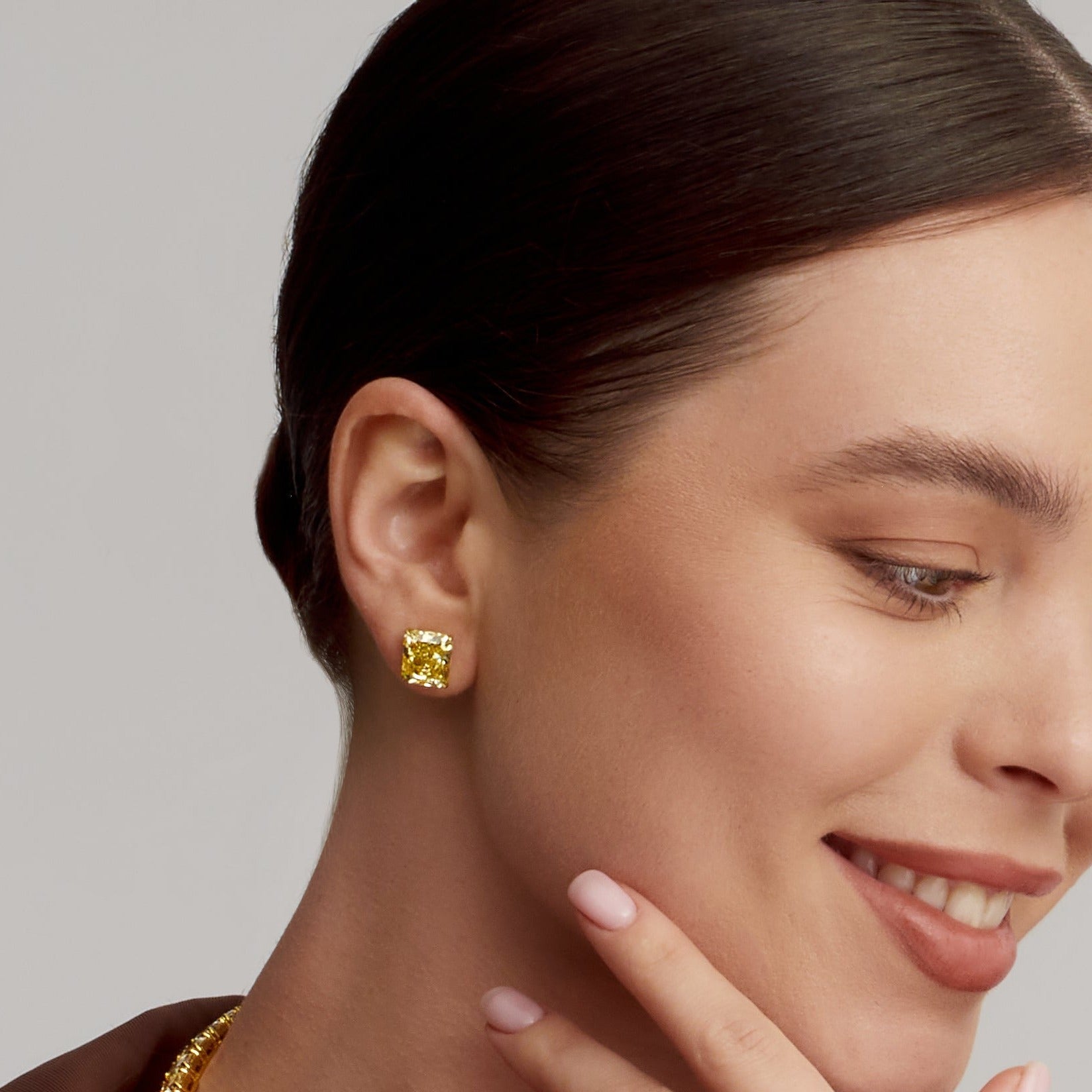 Radiant Cut Fancy Intense Yellow Diamond Stud Earrings in 18 Karat Yellow Gold