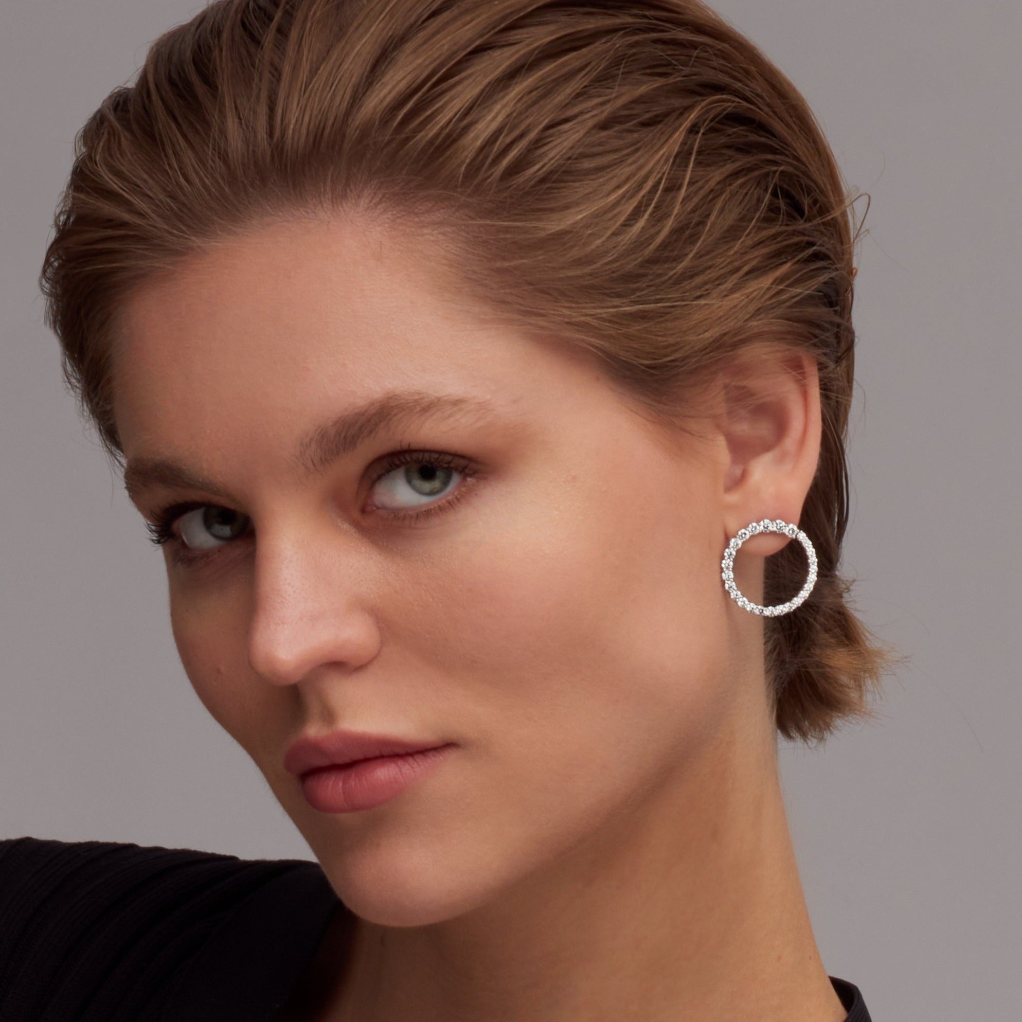 Graduated Round Cut Diamond Hoop Earrings in 18 Karat White Gold