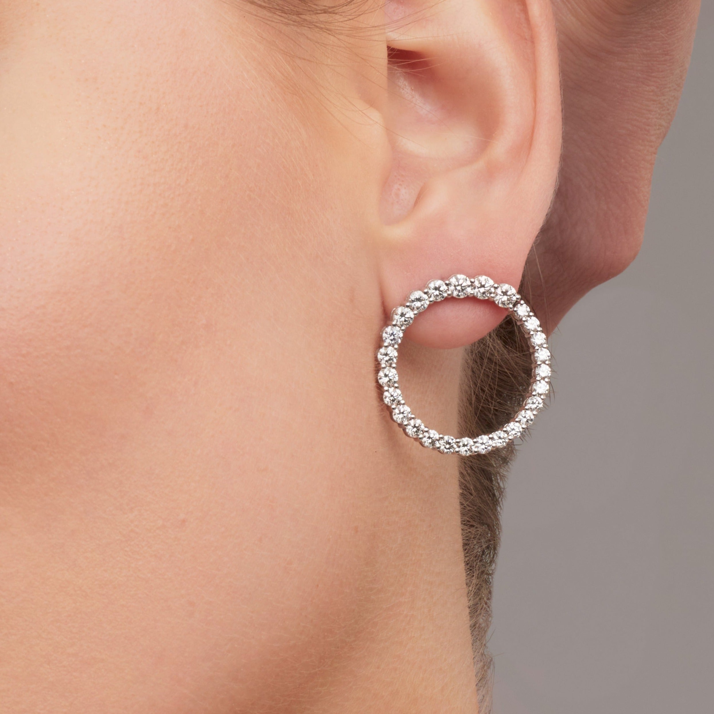 Graduated Round Cut Diamond Hoop Earrings in 18 Karat White Gold