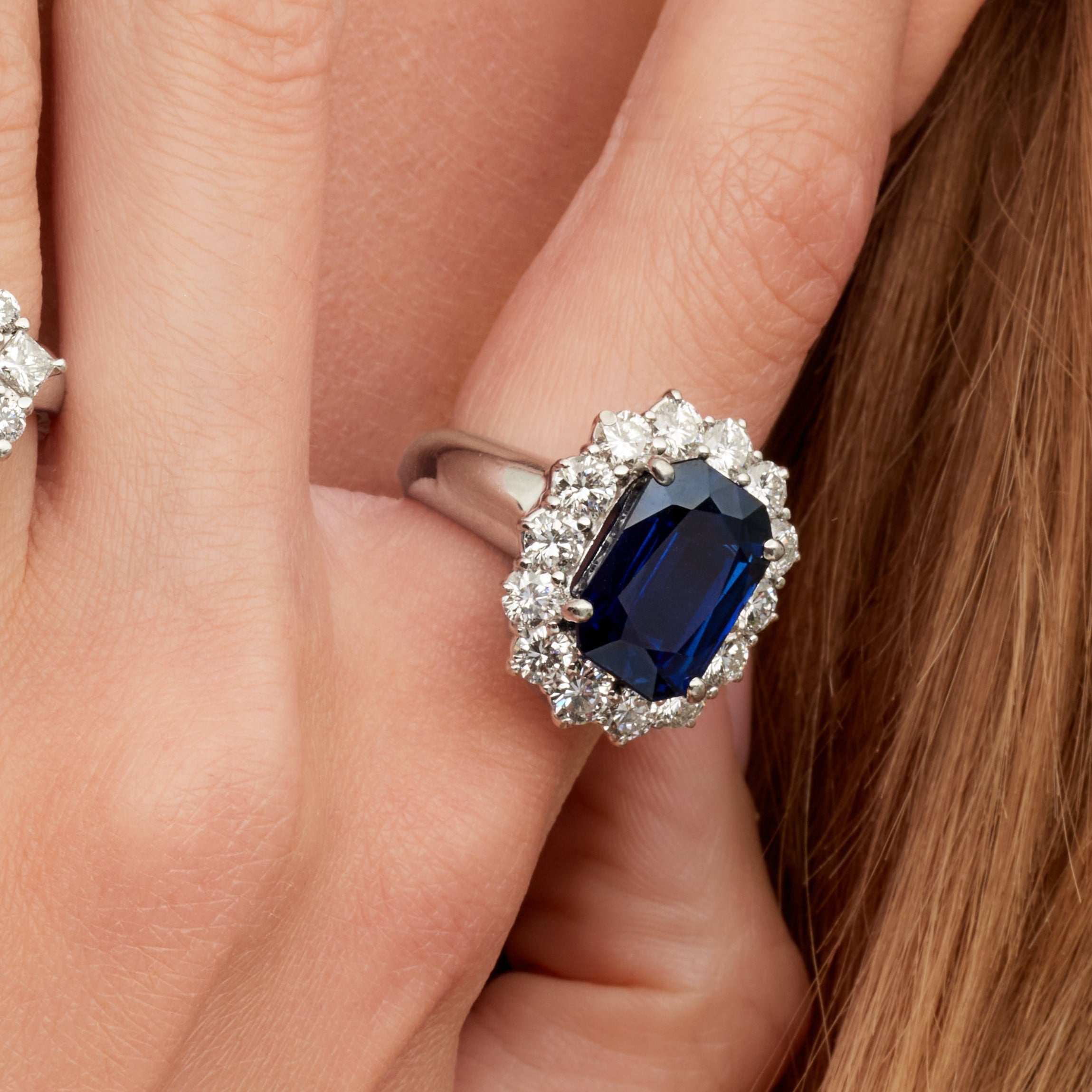 Radiant Cut Sapphire Ring with Round Cut Diamond Halo in Platinum Ruthenium
