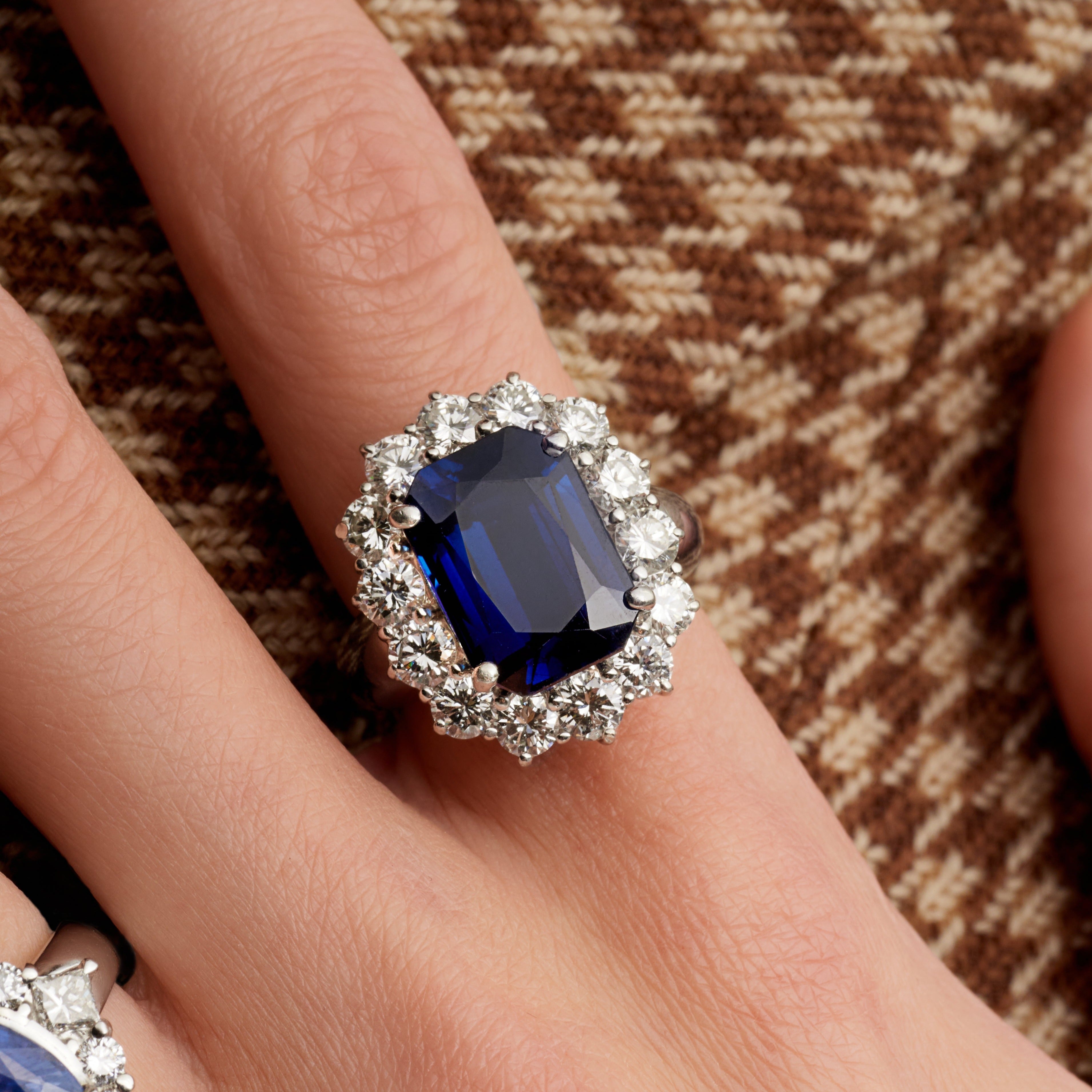 Radiant Cut Sapphire Ring with Round Cut Diamond Halo in Platinum Ruthenium