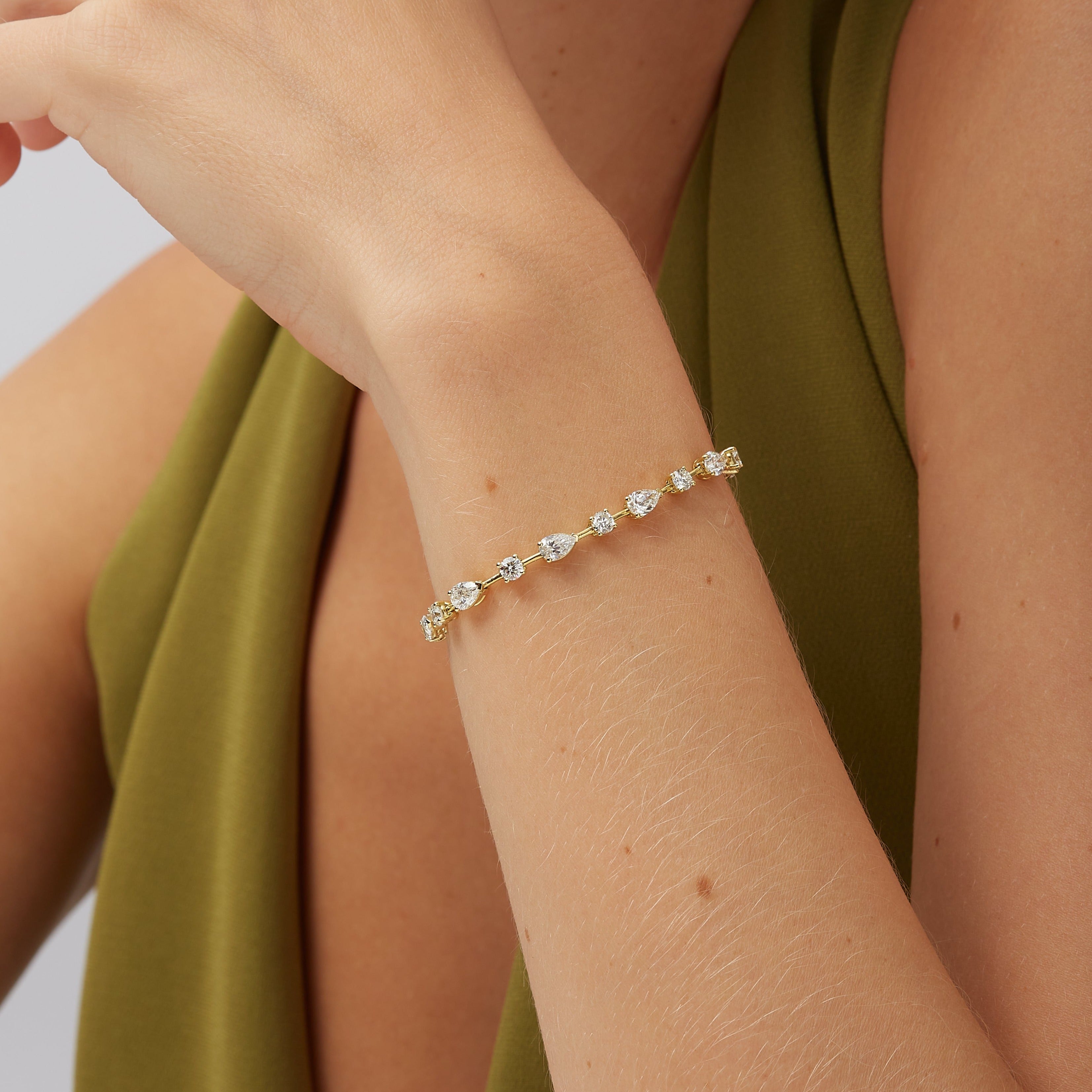 5.84ctw Alternating Pear and Round Brilliant Cut Diamond Tennis Bracelet in 18K Yellow Gold