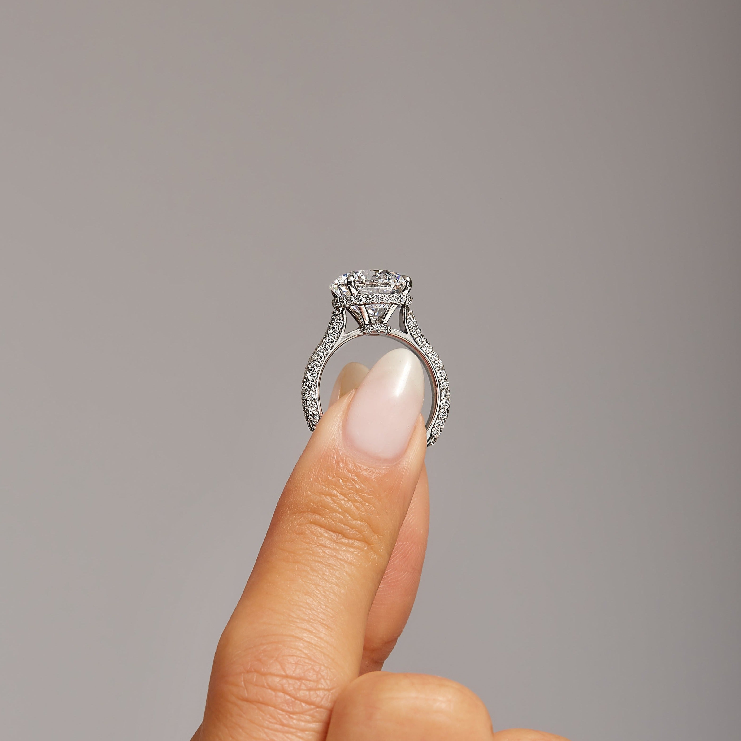 5.02ct Round Brilliant Diamond in Pavé Platinum Band, GIA Certified