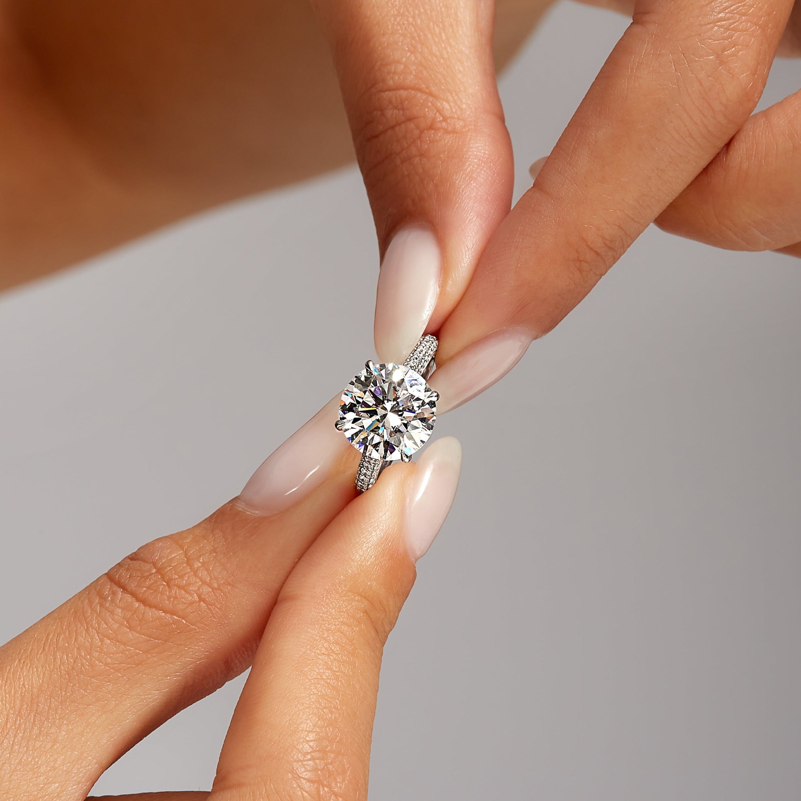 5.02ct Round Brilliant Diamond in Pavé Platinum Band, GIA Certified
