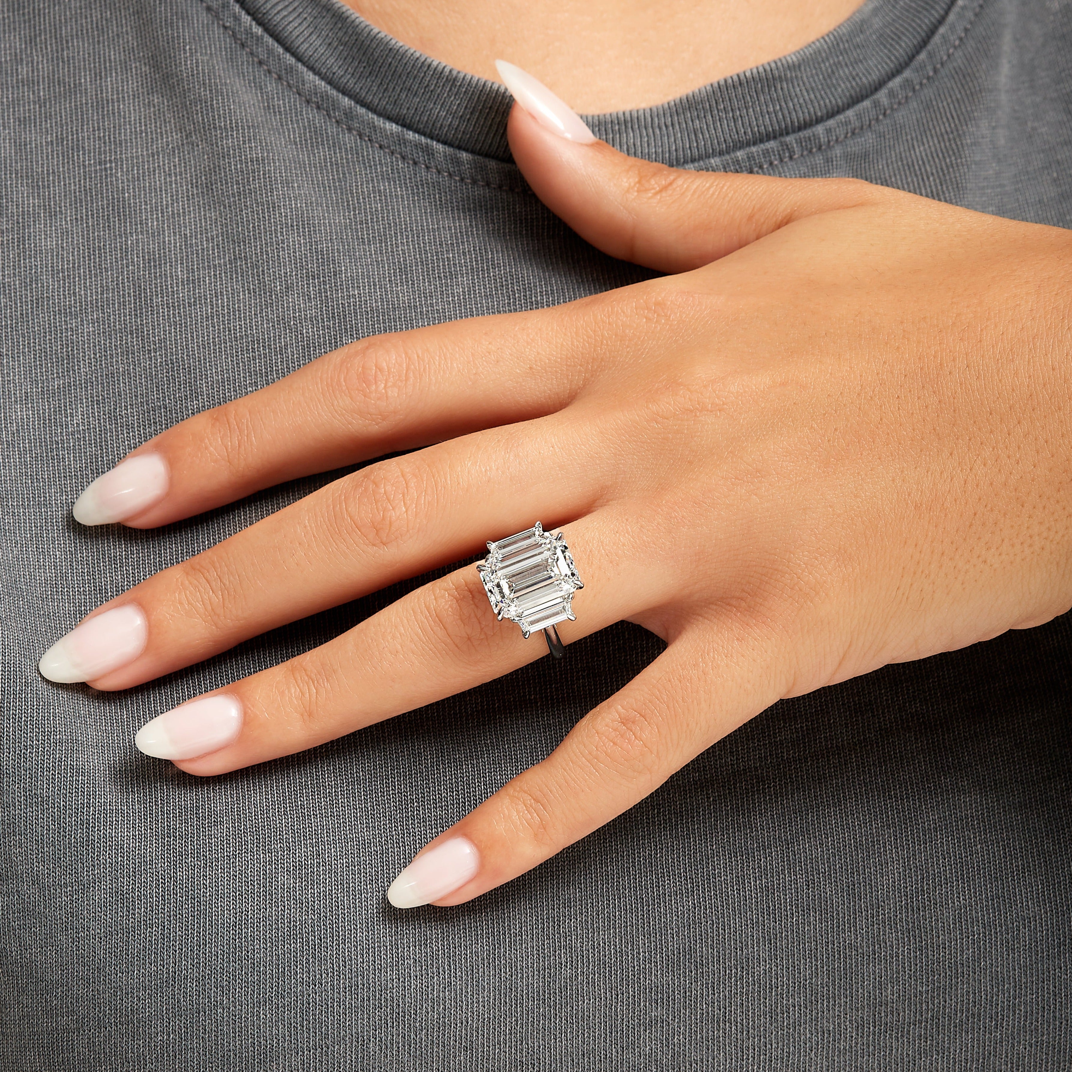 4.01ct Emerald Cut Diamond Three Stone Ring with Trapezoid Side Stones in Platinum Band, GIA Certified