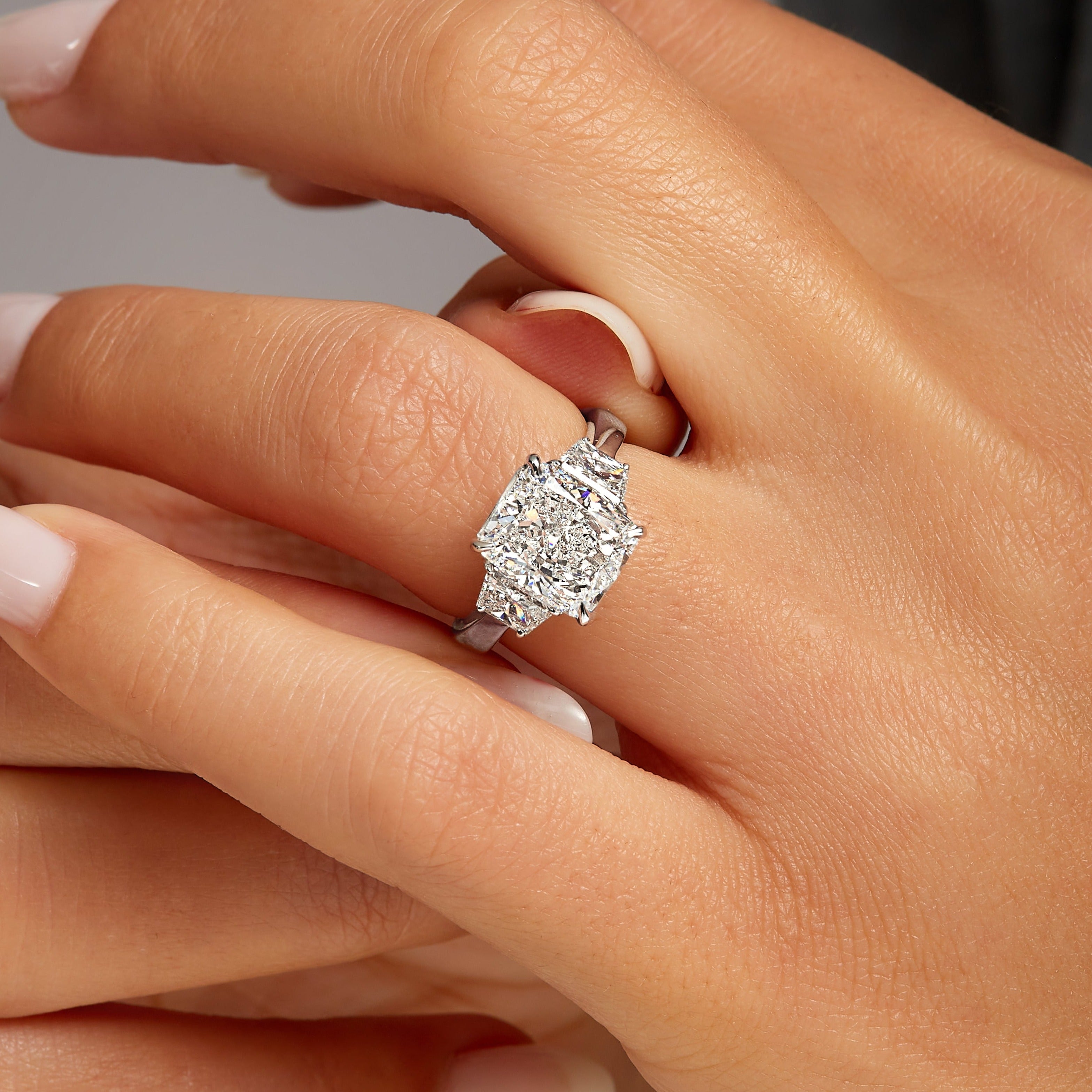 4.05ct Cushion Cut Diamond Three Stone Ring with Trapezoid Side Stones in Platinum Band, GIA Certified