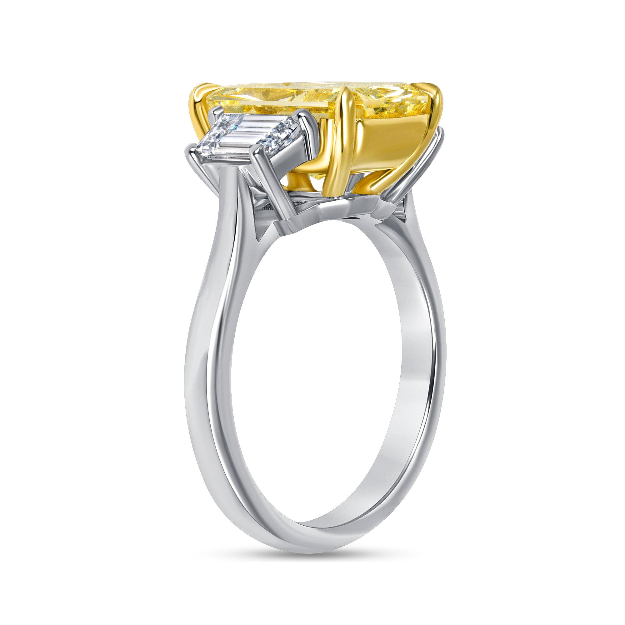 Radiant Cut Fancy Yellow Diamond and Trapezoid Diamond Side Stones Three Stone Ring in 18 Karat Yellow Gold and Platinum