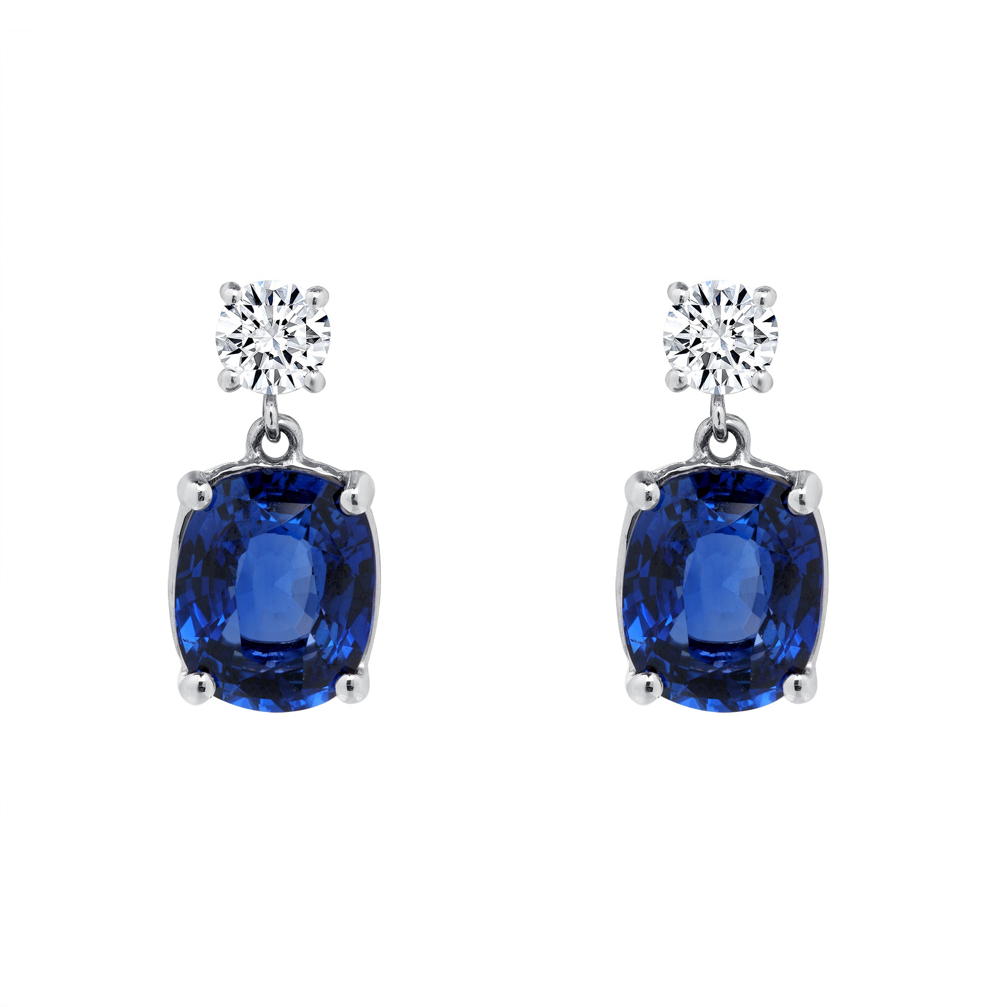 Blue Sapphire And Diamond Dangling Earrings In 18 Karat White Gold
