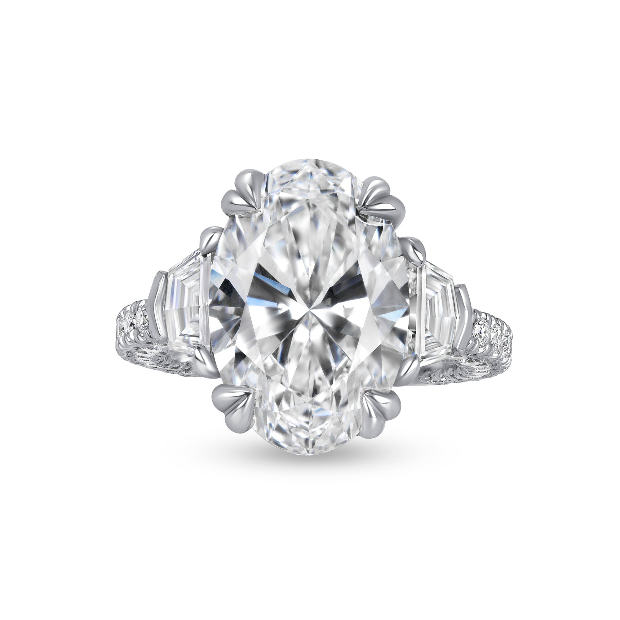 Oval Cut Diamond Three Stone Ring with Trapezoid Cut Diamond Side Stones in Platinum