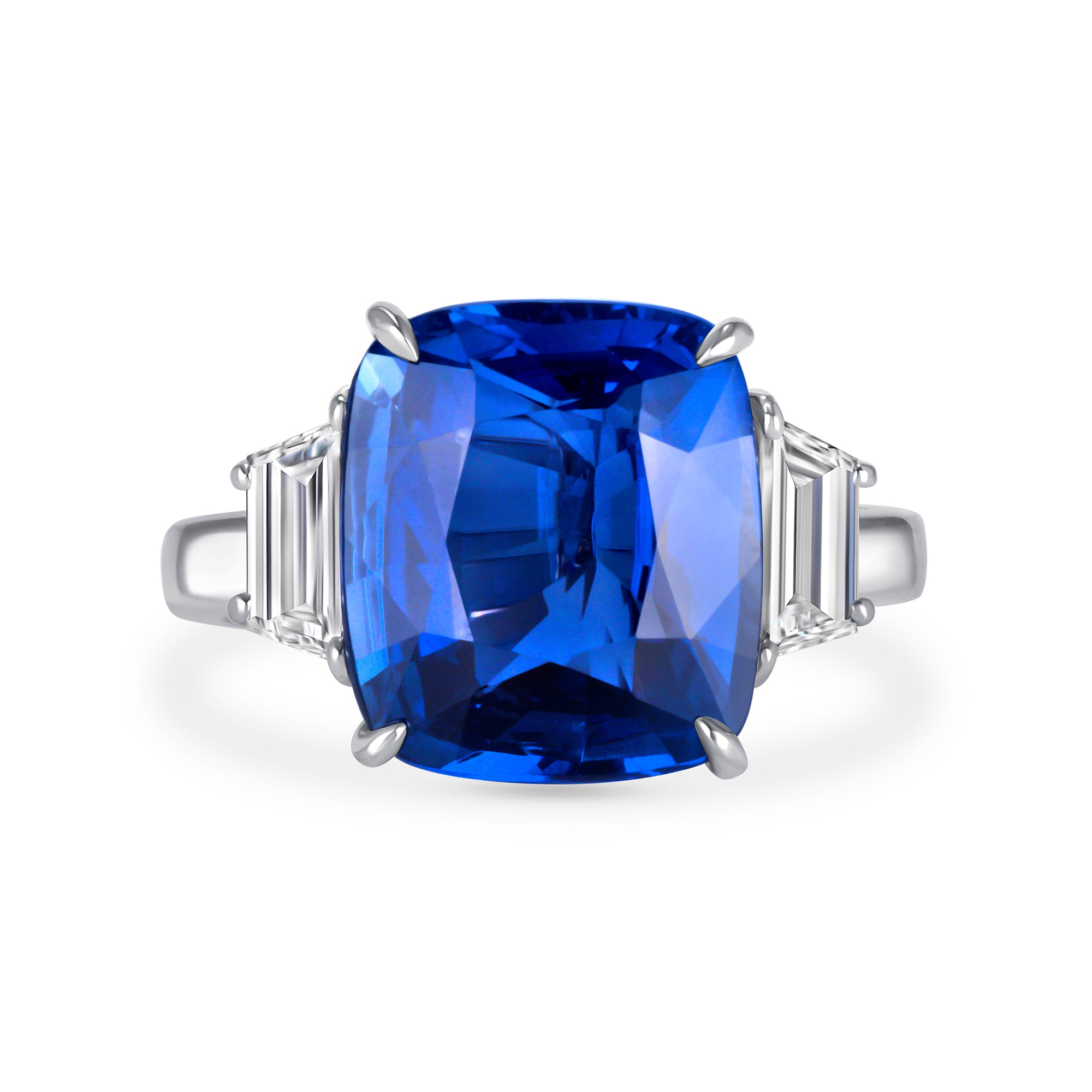 Cushion-Cut Blue Sapphire and Diamond Three-Stone Ring in Platinum