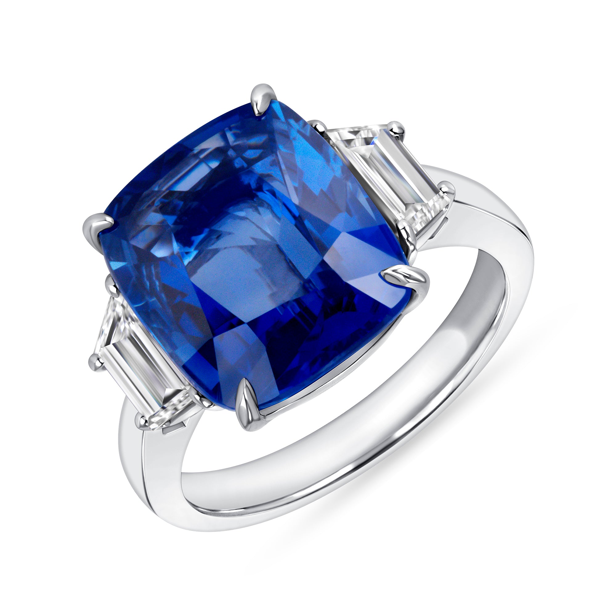 Cushion-Cut Blue Sapphire and Diamond Three-Stone Ring in Platinum