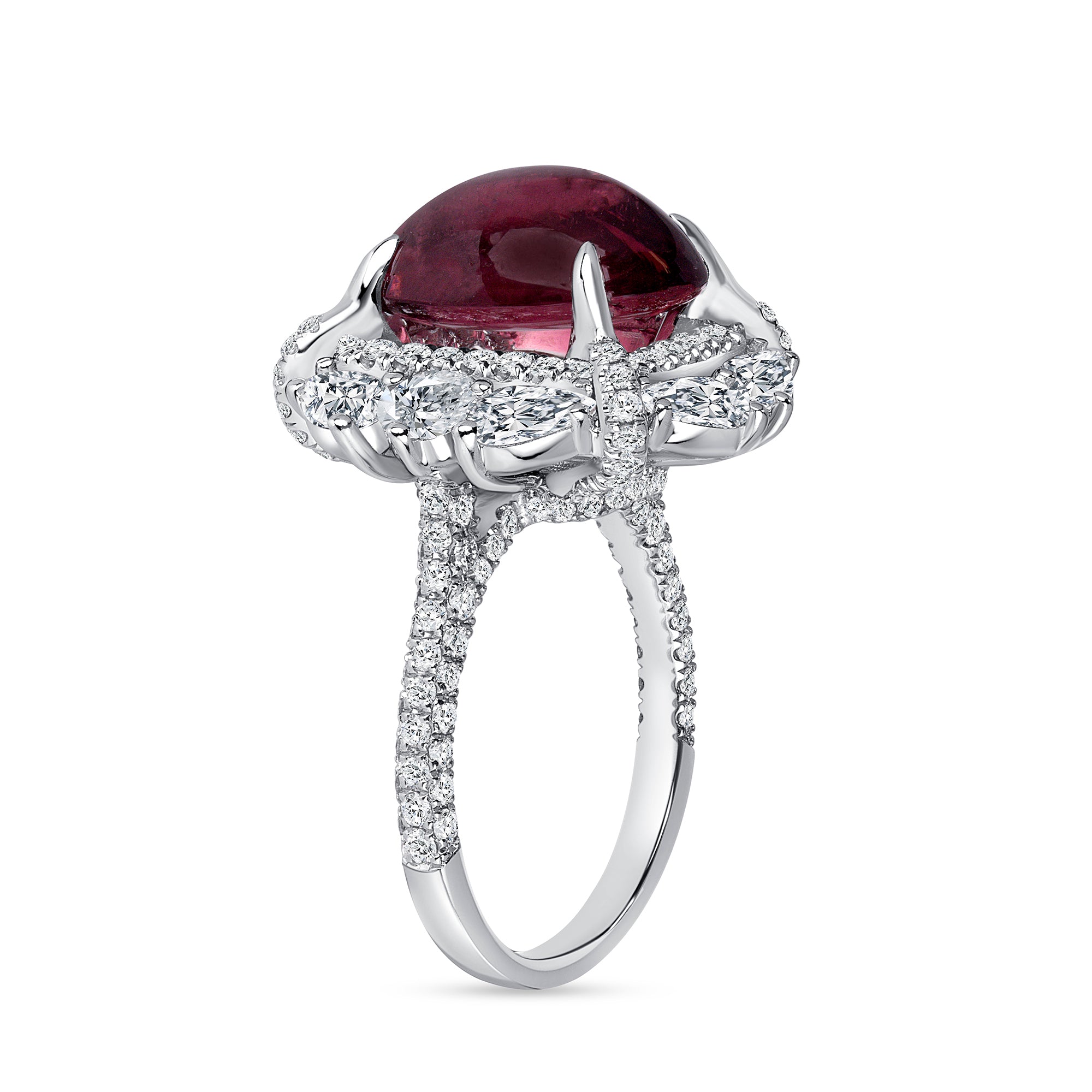 Oval Cut Ruby Cabochon Ring With A Diamond Halo In Platinum Ruthenium