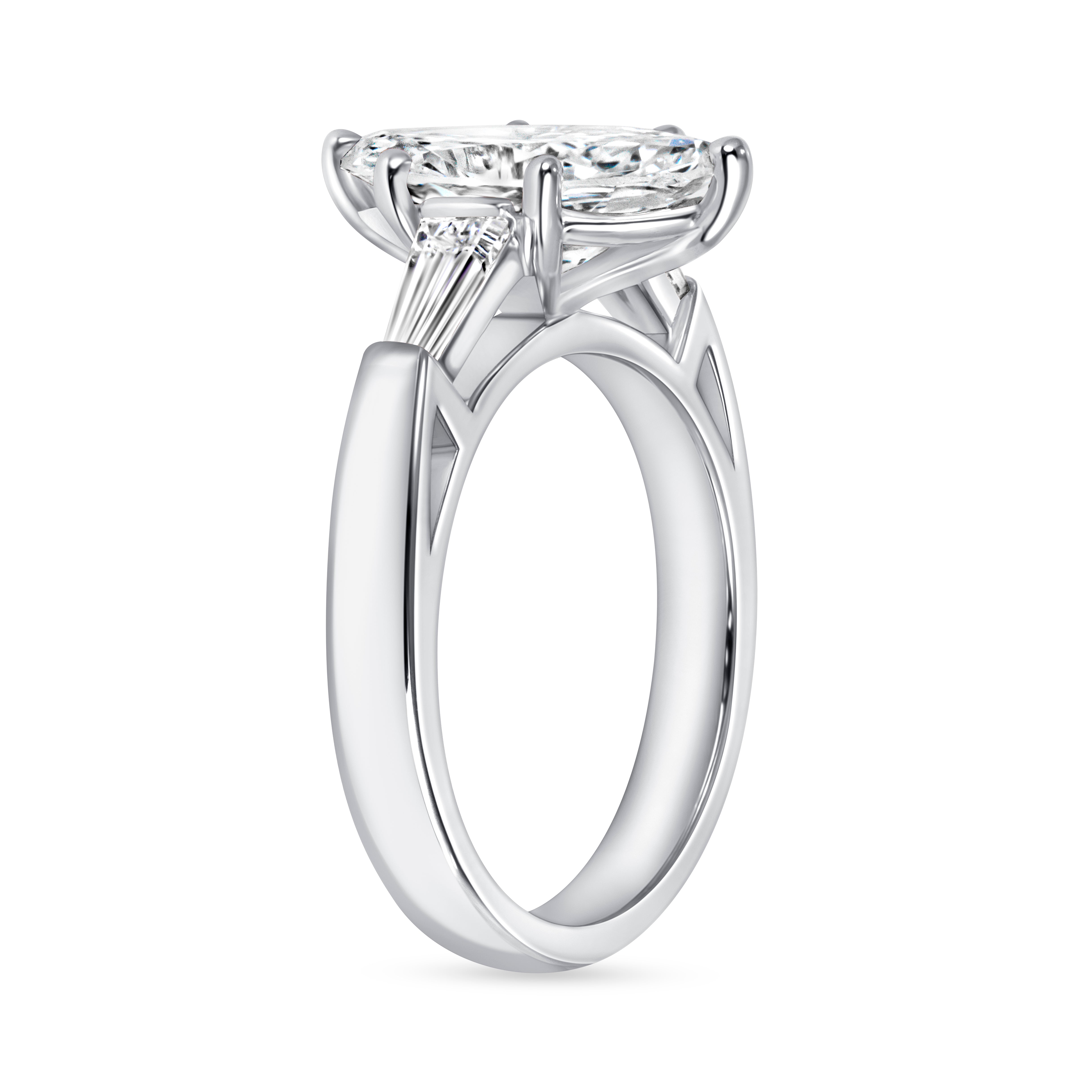 Marquise Cut Diamond Three-Stone Ring with Tapered Baguette Side Stones in Platinum