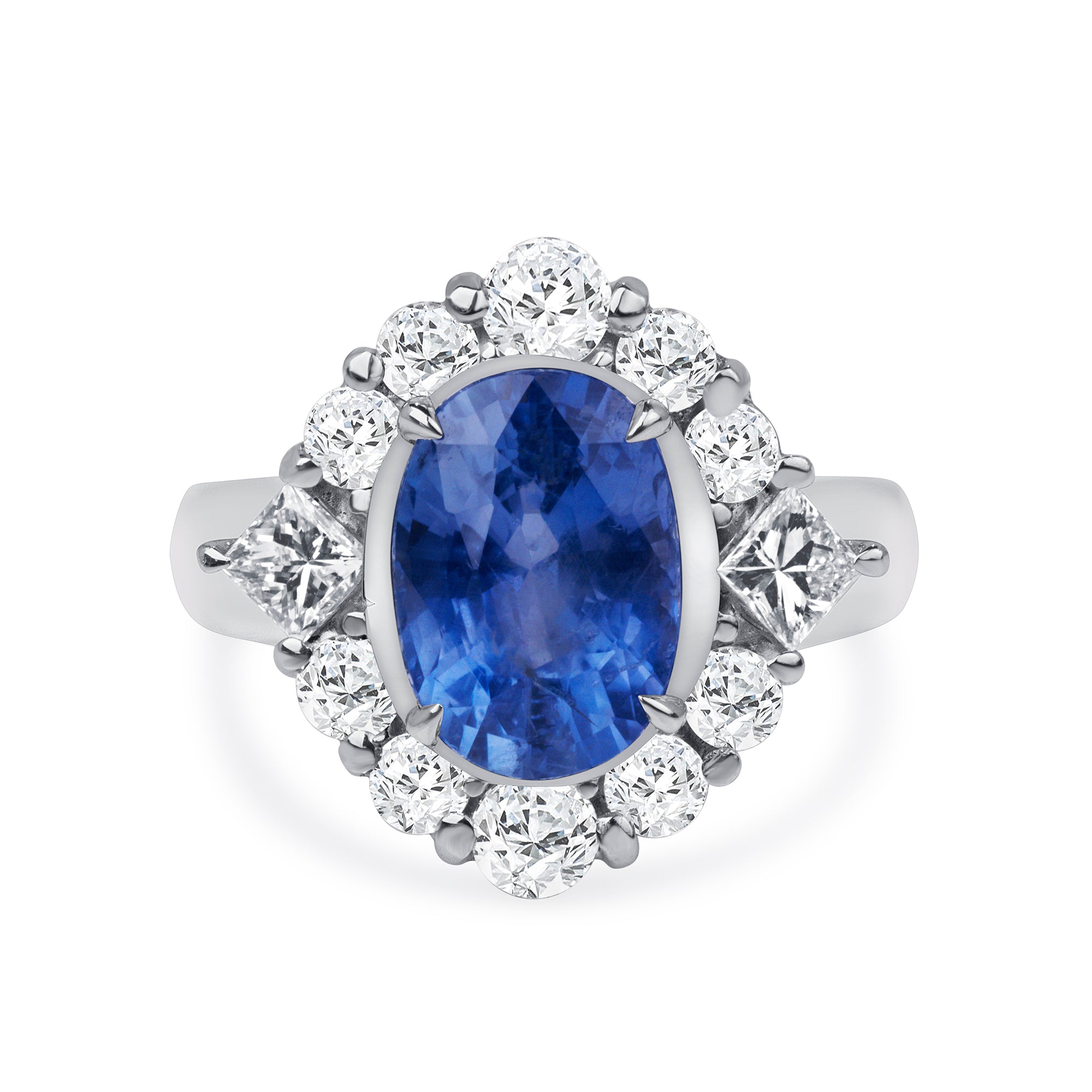 Oval Blue Sapphire and Diamond Halo Ring in Platinum