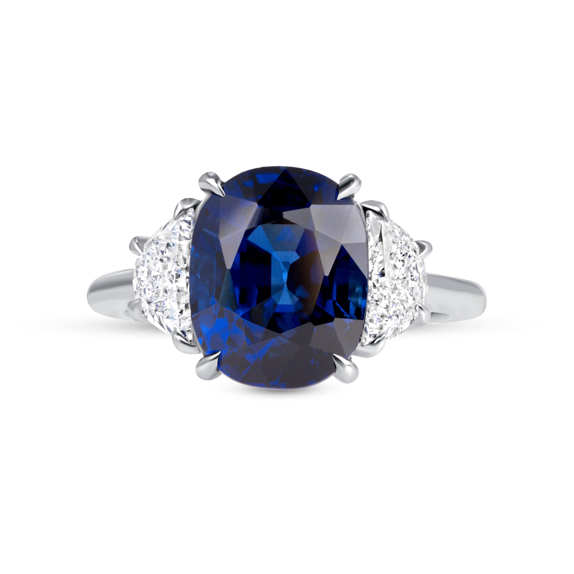 Cushion Cut Blue Sapphire and Trapezoid Cut Diamond Three Stone Ring in Platinum
